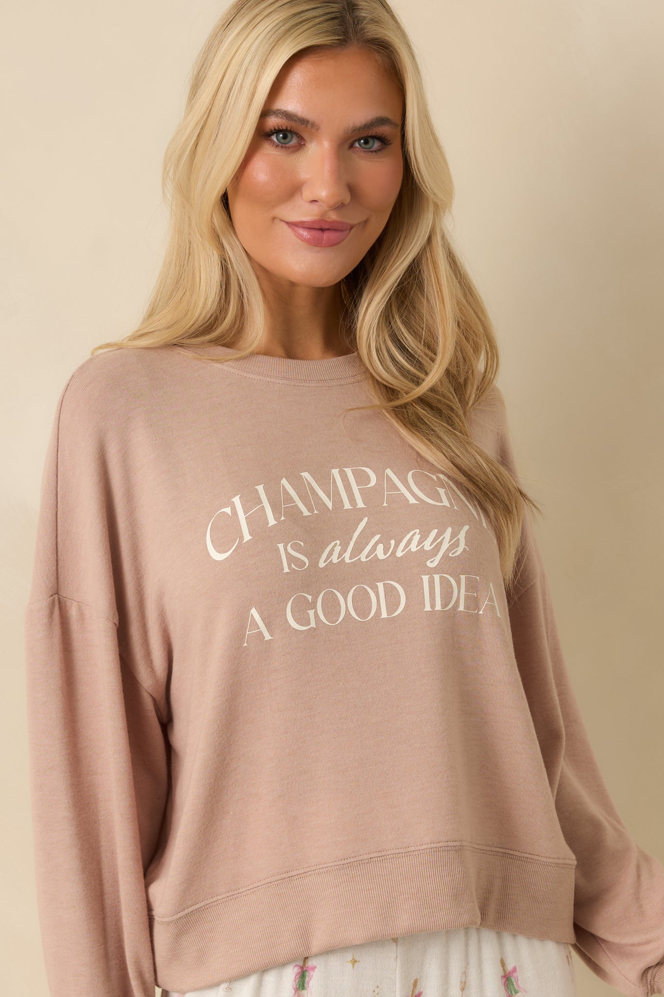 View emphasizing the front knit texture and printed message.