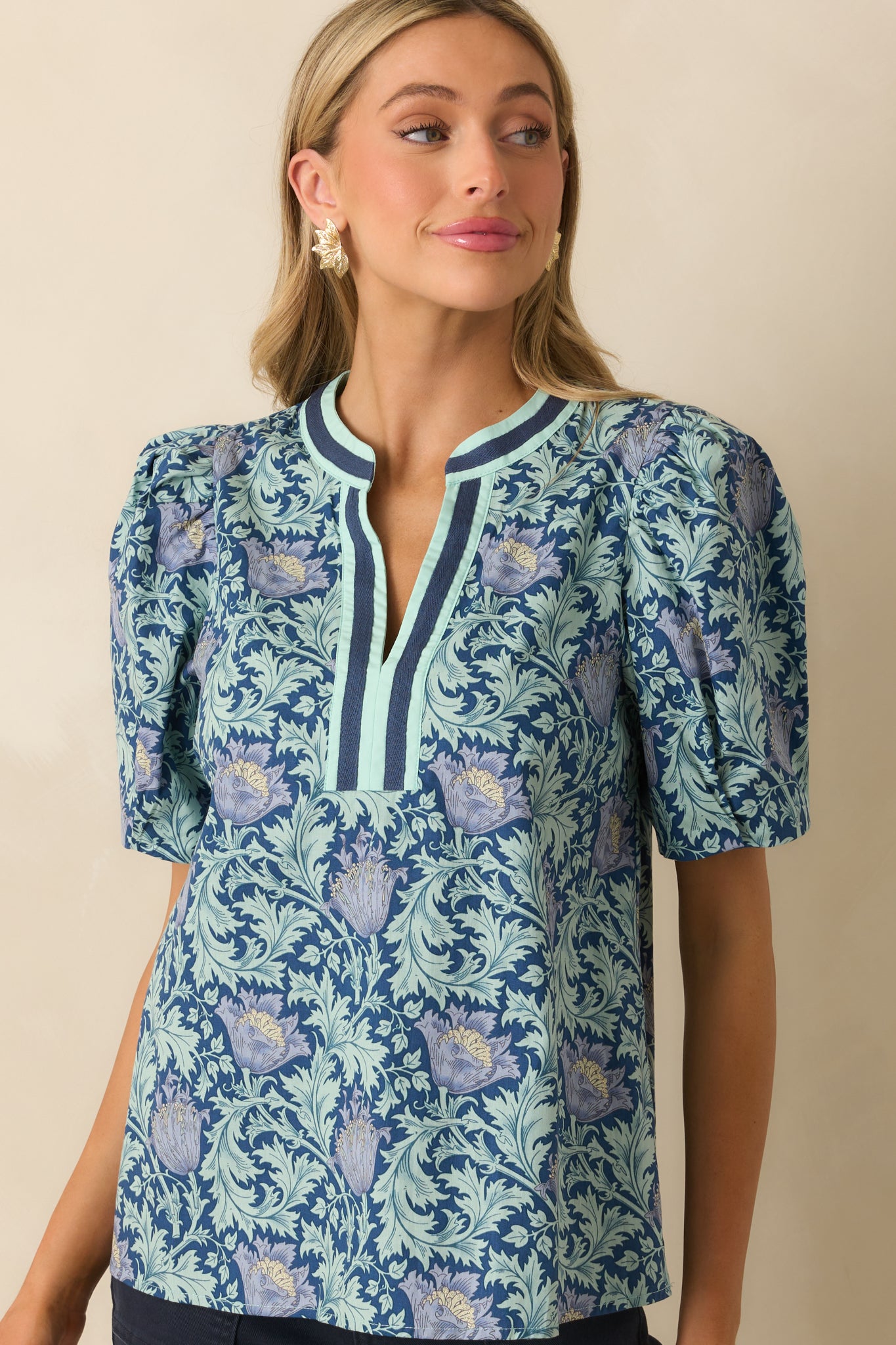 A cropped front view showing the relaxed fit and fabric drape across the torso.