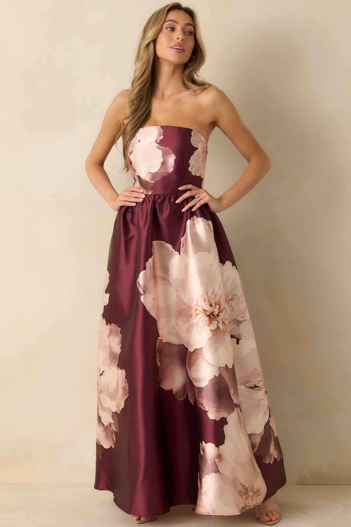 Front-facing image highlighting the rich burgundy floral print and the elegant, floor-length satin fabric.