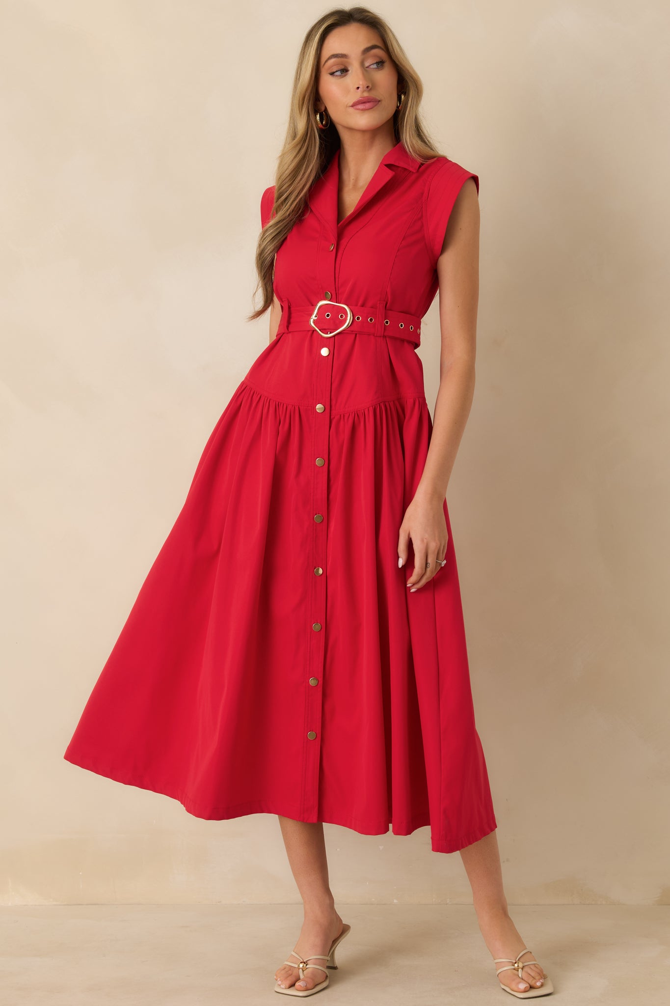 Front-facing view emphasizing the sleeveless cut and flowing skirt with gentle volume.