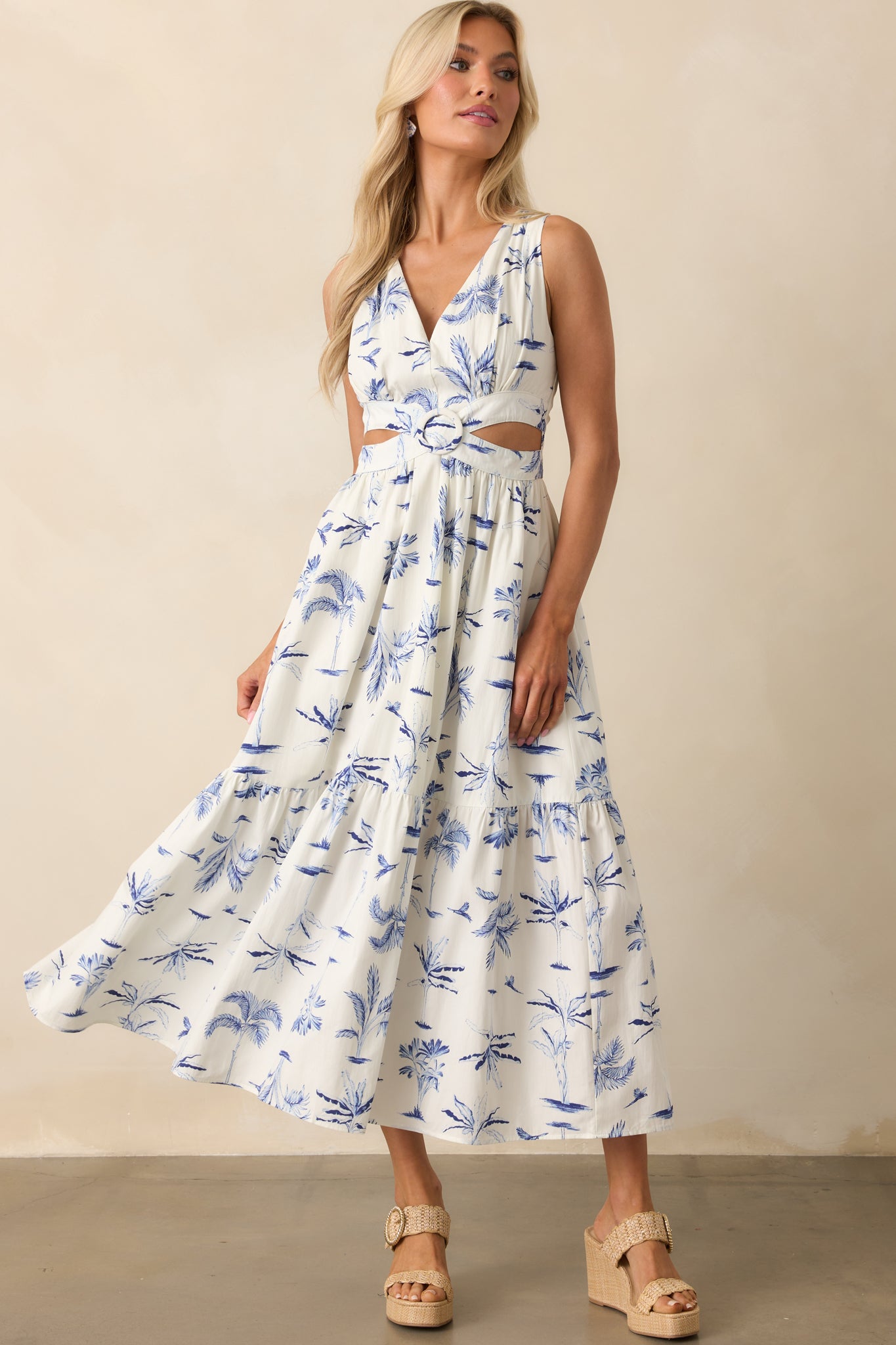 Complete front view emphasizing the watercolor palm print and structured waist detailing.