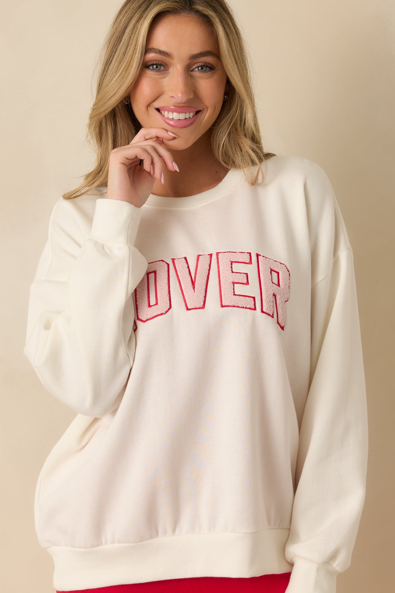 Front-focused view highlighting the raised “LOVER” lettering and smooth material