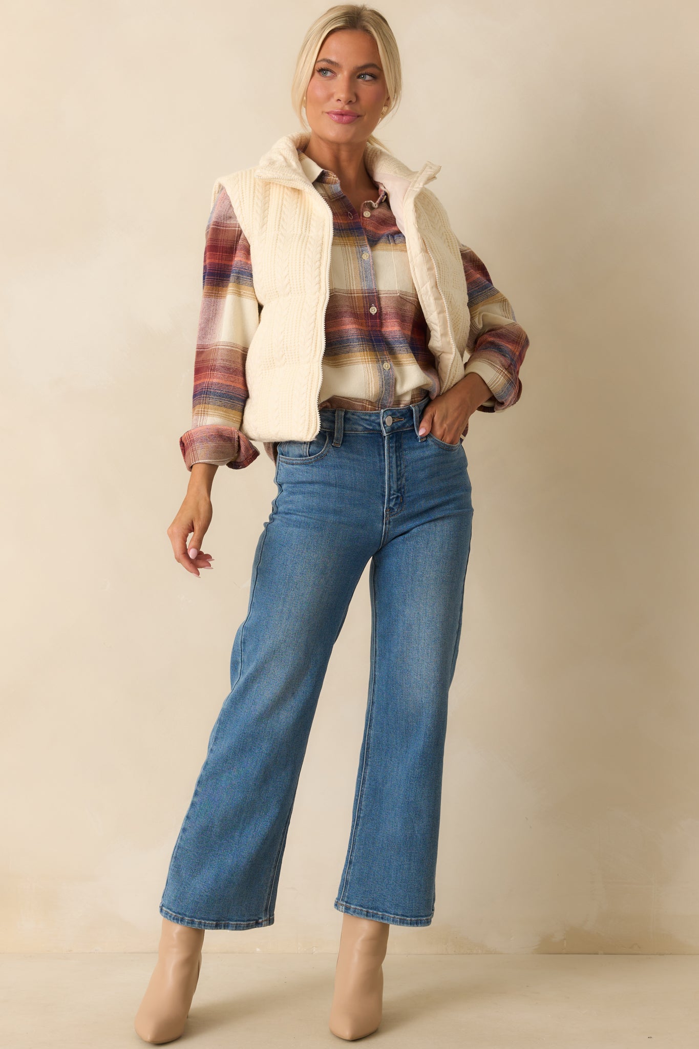 Front view of an ivory multi plaid shirt featuring brushed flannel fabric, relaxed fit, and functional buttons along the front.