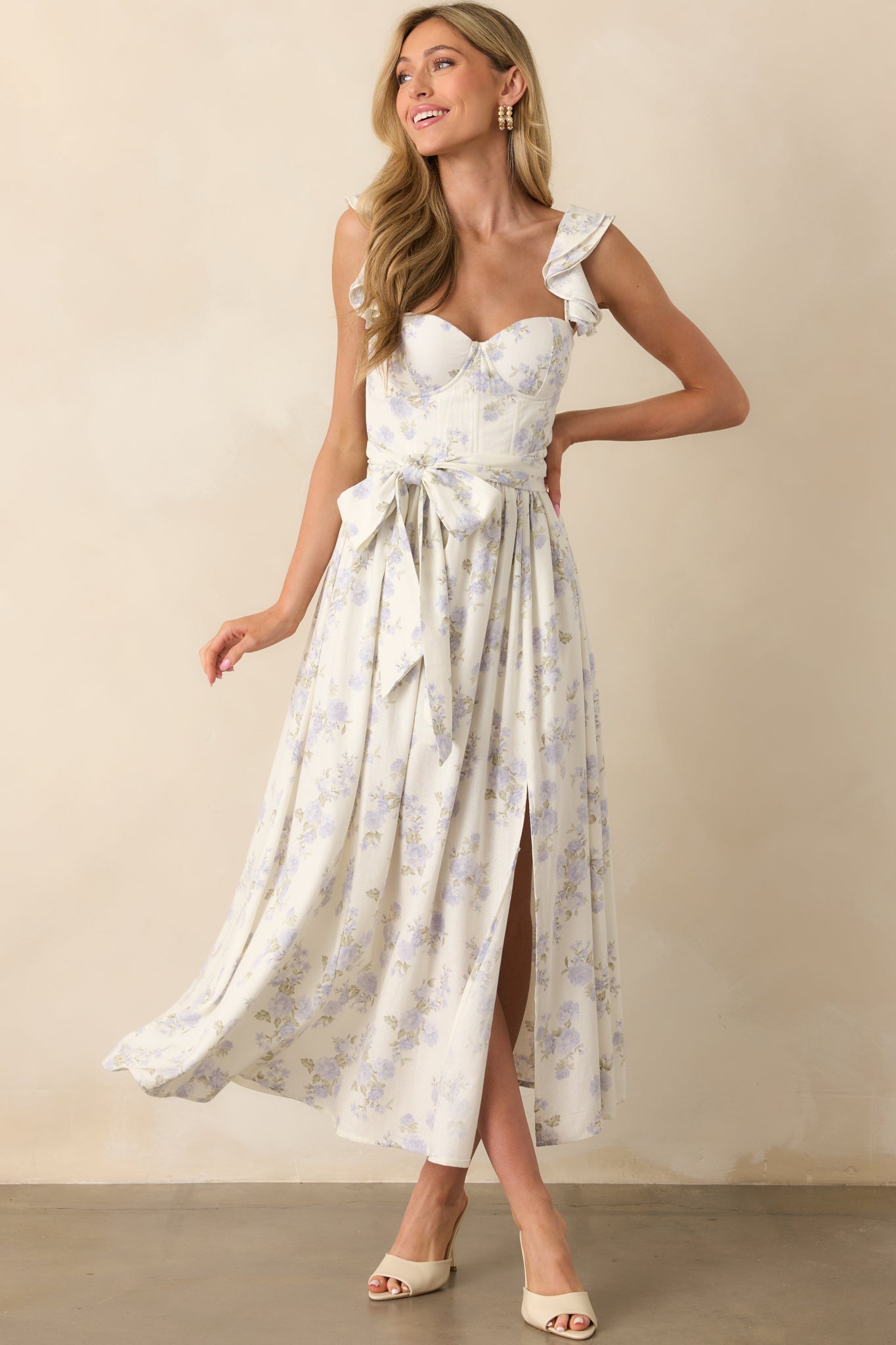 Front-facing image emphasizing the flow of the linen blend fabric and the optional self-tie belt cinching the waist.