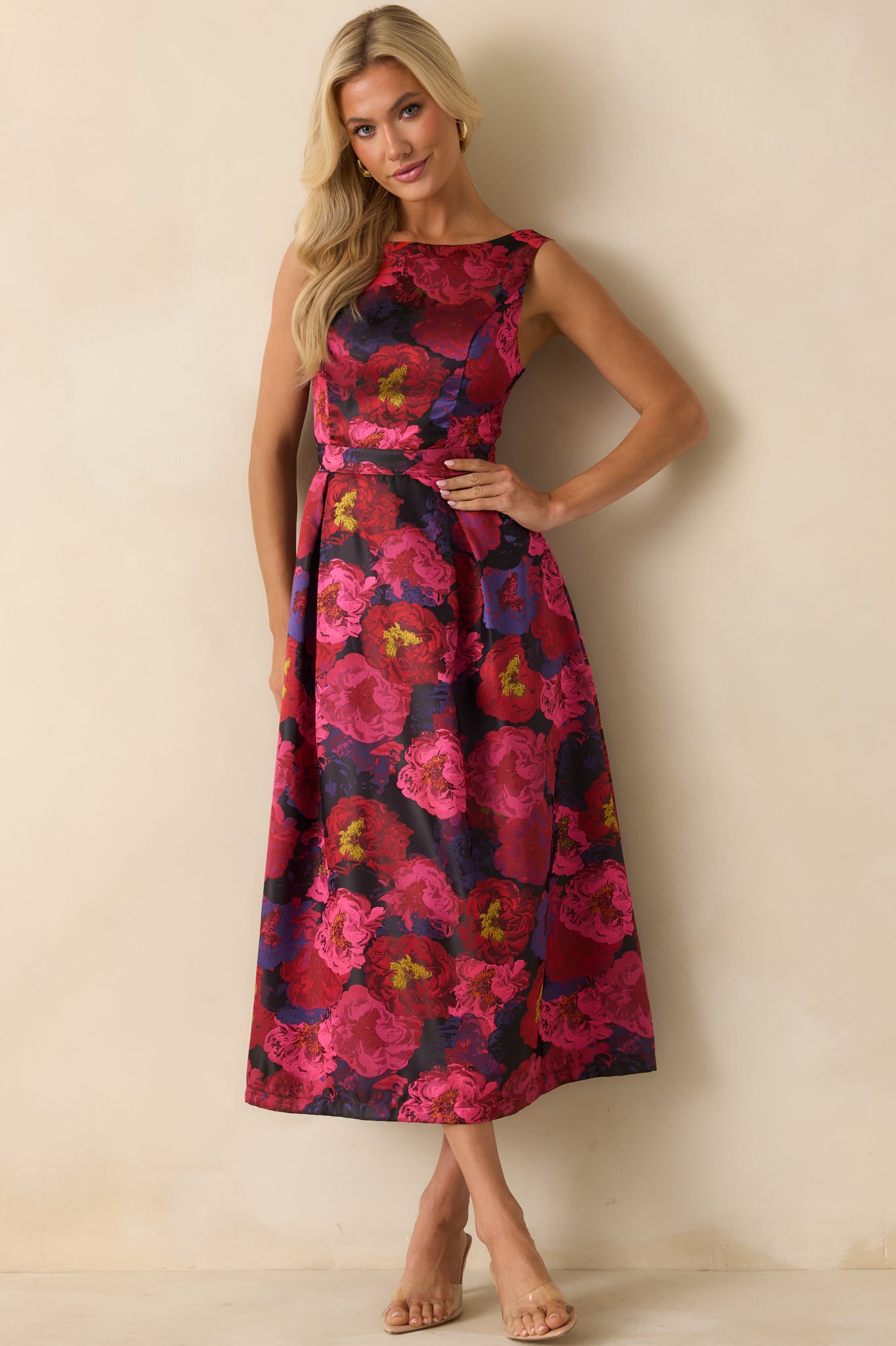 Front view of the magenta floral jacquard midi dress highlighting the sleeveless bodice and pleated A-line skirt.