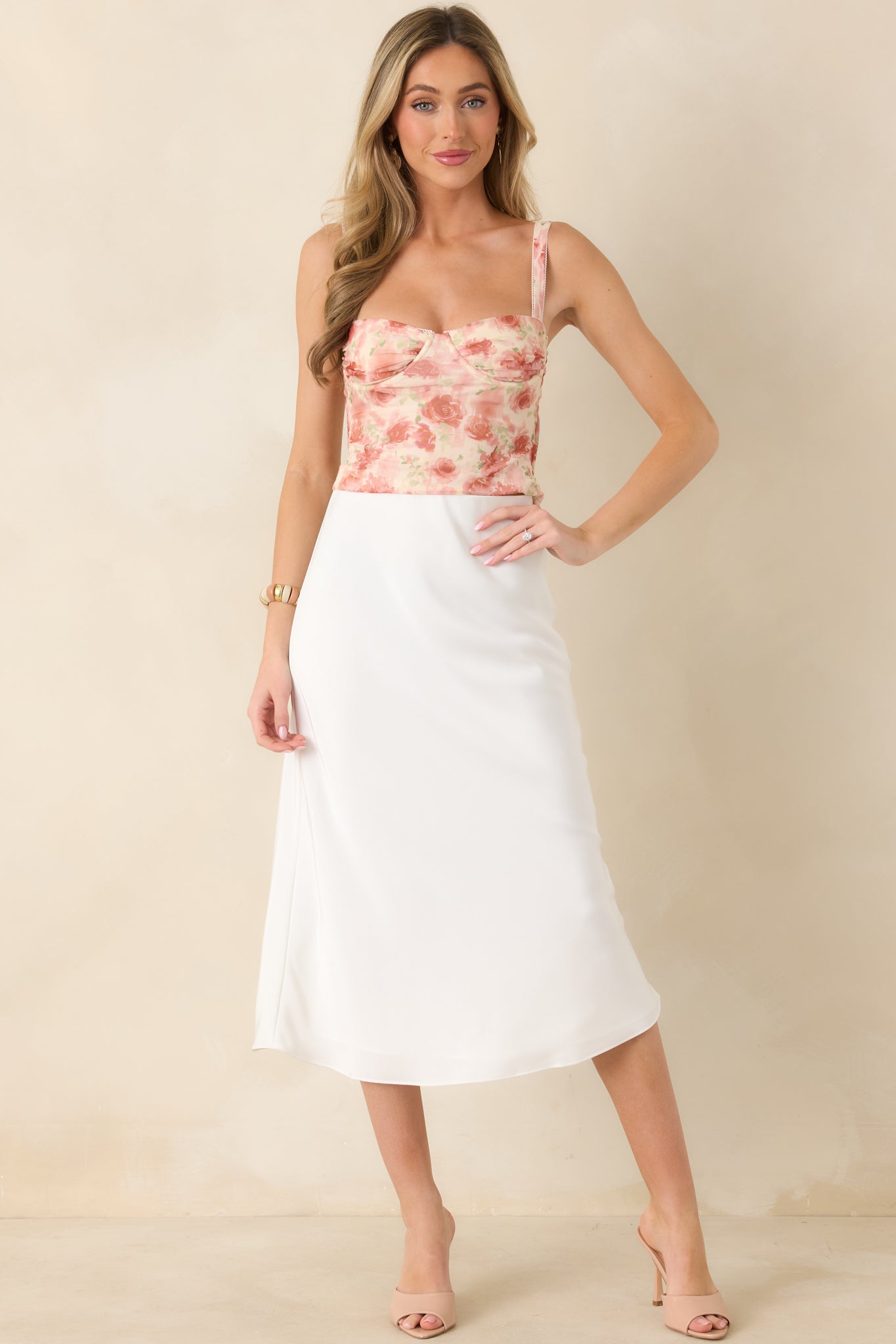 Full-length front view of pink floral overlay bustier showcasing semi-sheer detailing and flattering silhouette.