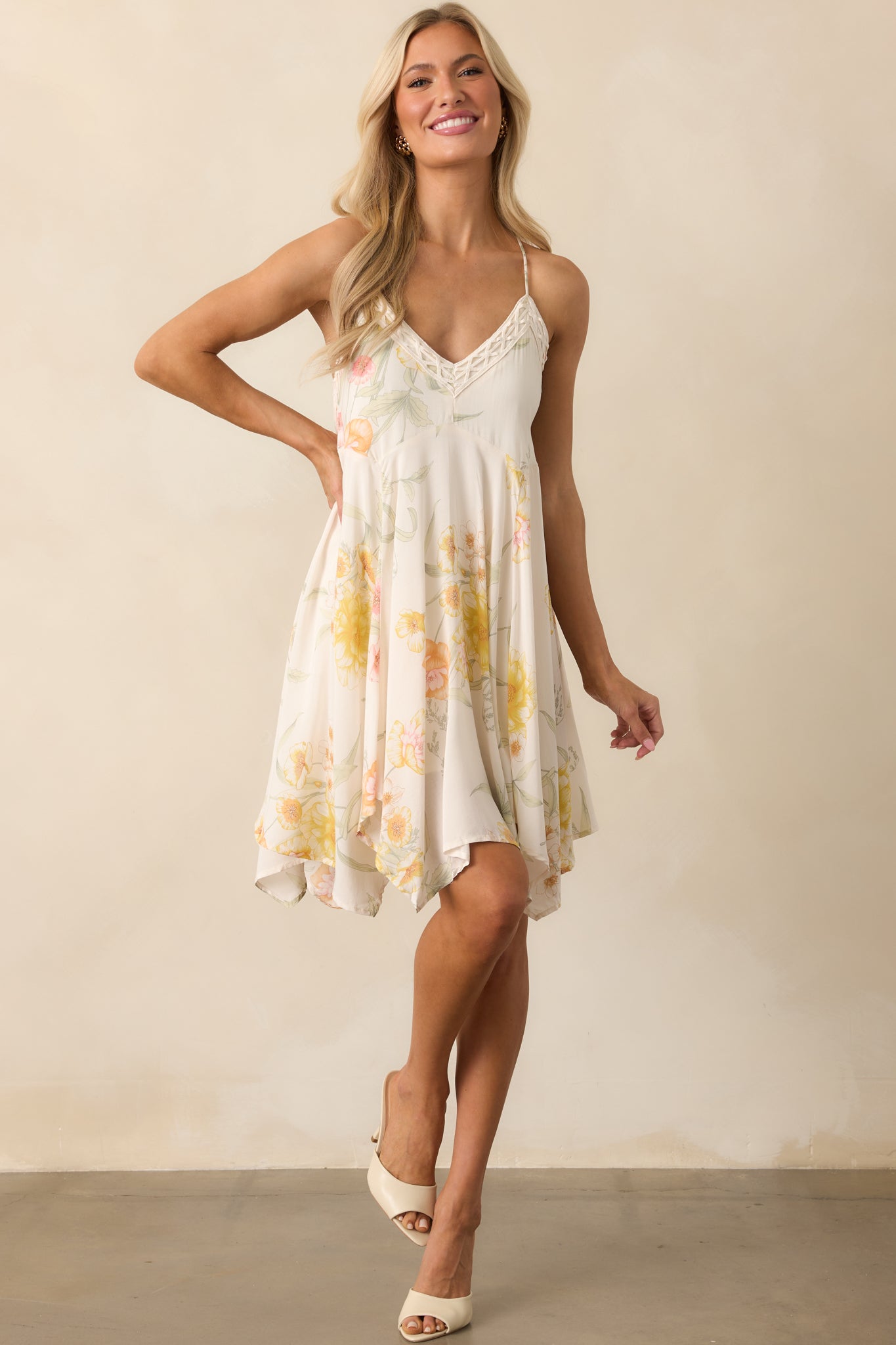 Full body front view emphasizing the flattering cut and movement of the flowy floral dress.