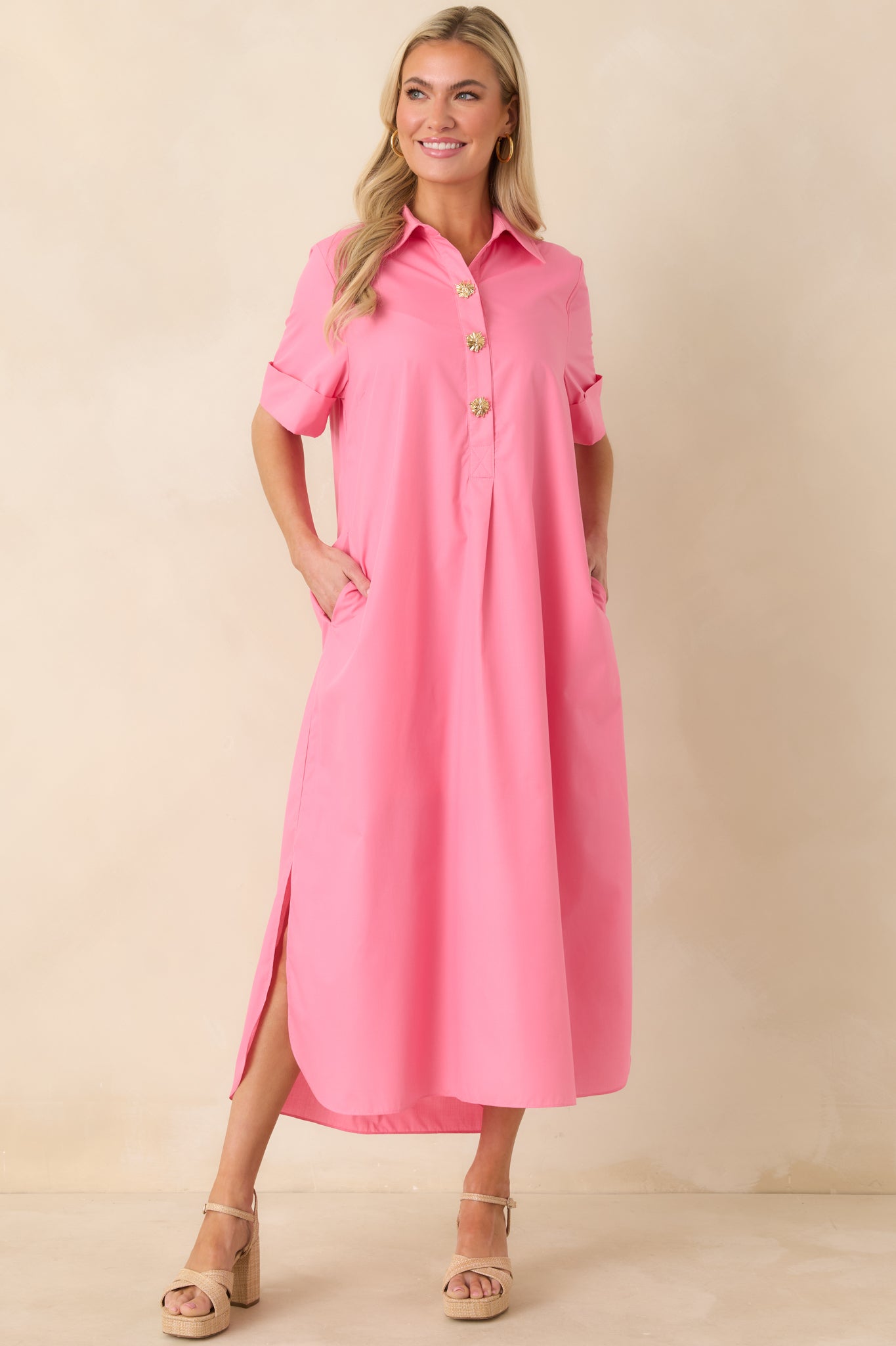 Complete front view showcasing the collared neckline, button-front detail, and flowing maxi length.