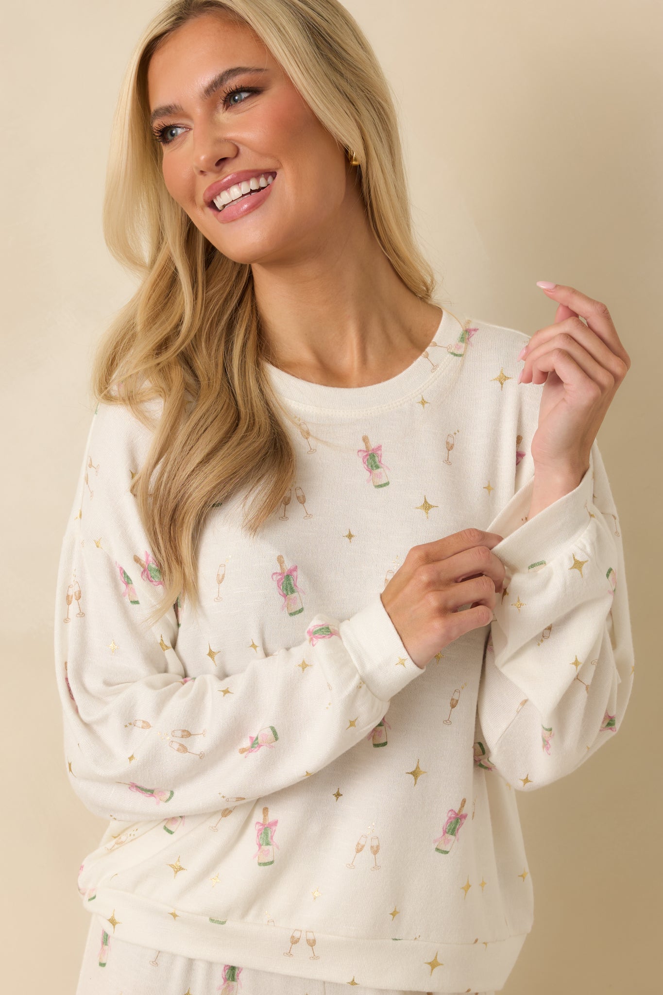 Front view highlighting the wide crew neckline and dropped shoulder design.