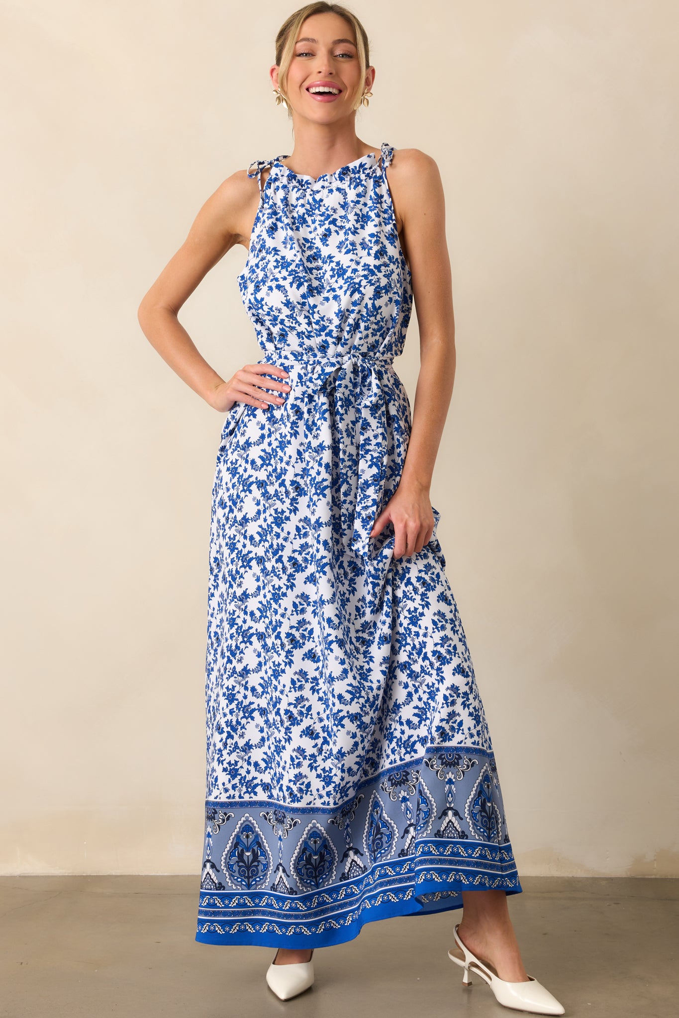 Frontal shot of the dress highlighting the delicate blue floral pattern and casual, structured silhouette.