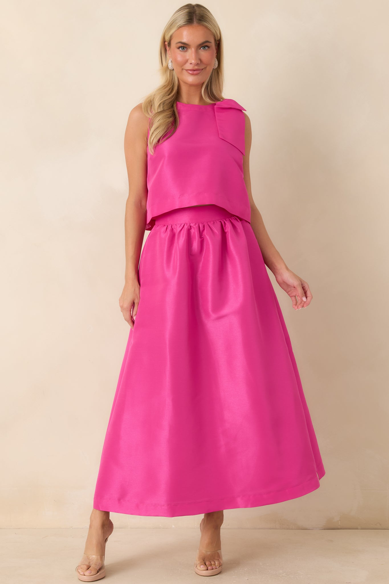 Structured woven maxi skirt showcasing a flowing design, side slit, and functional side pockets
