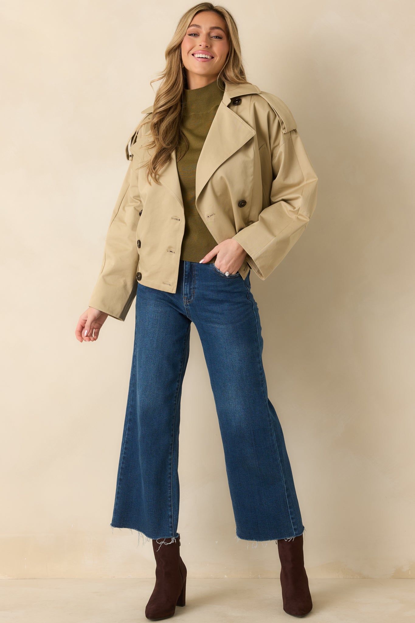 Straight-on full body perspective featuring cotton fabric finish, long sleeves, and relaxed cropped fit.