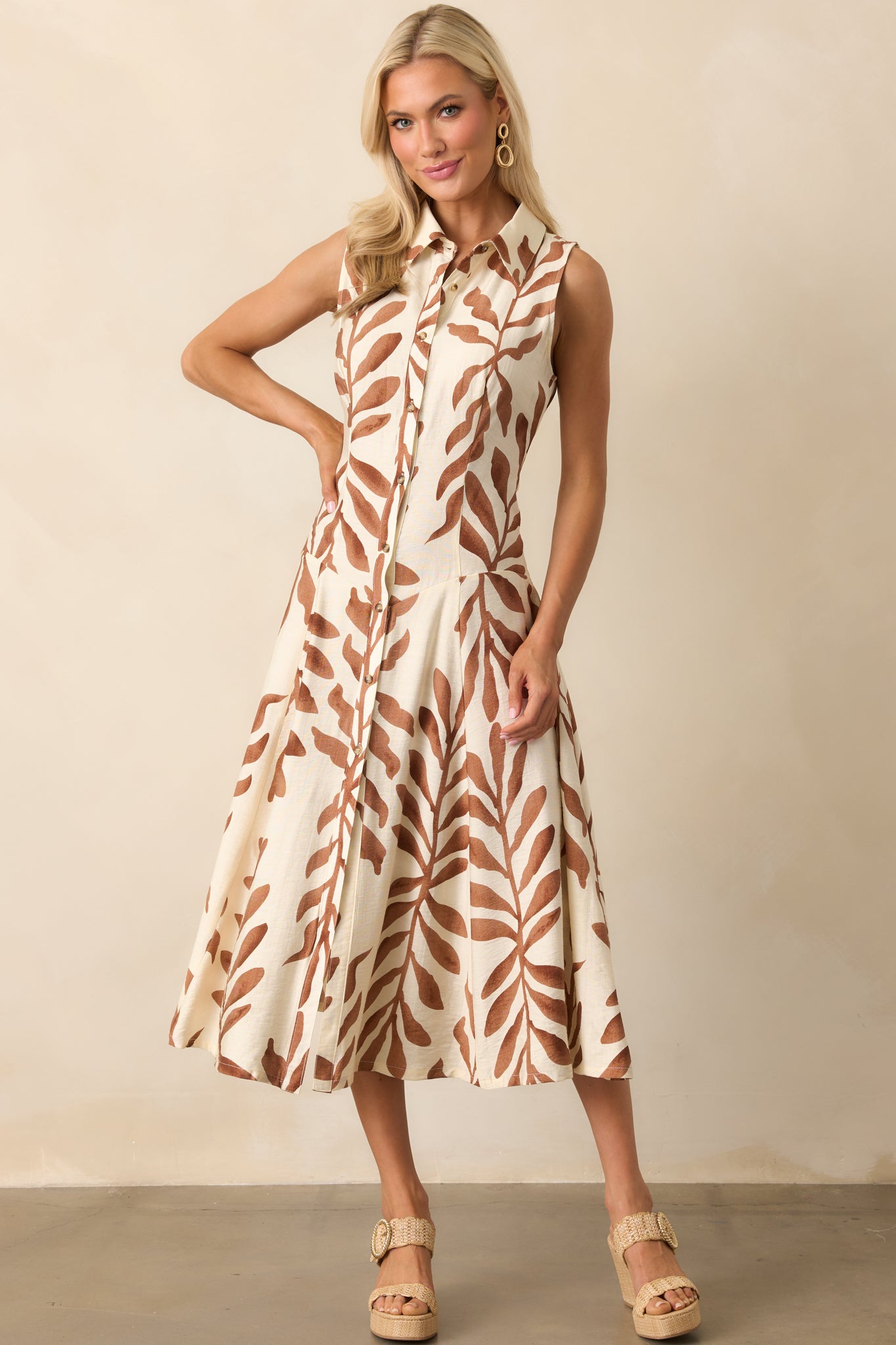 Full body front-facing image focusing on the contrast between the collared neckline and relaxed drop waist fit.