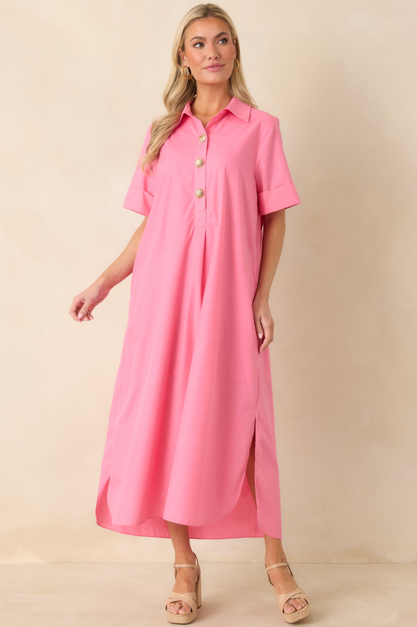 Front-facing full body image showcasing the maxi-length silhouette and clean, structured shape.