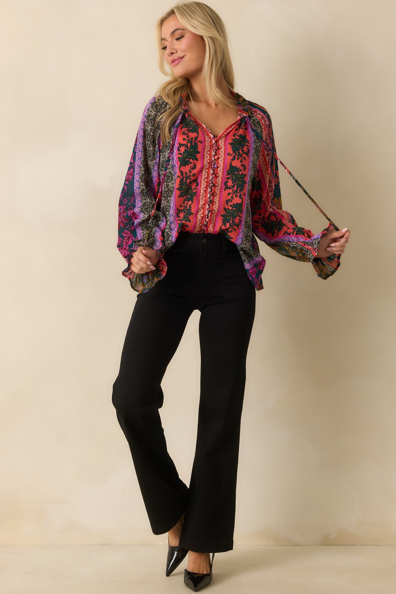 A full body view highlighting the functional button-front closure and ruffle trim details.