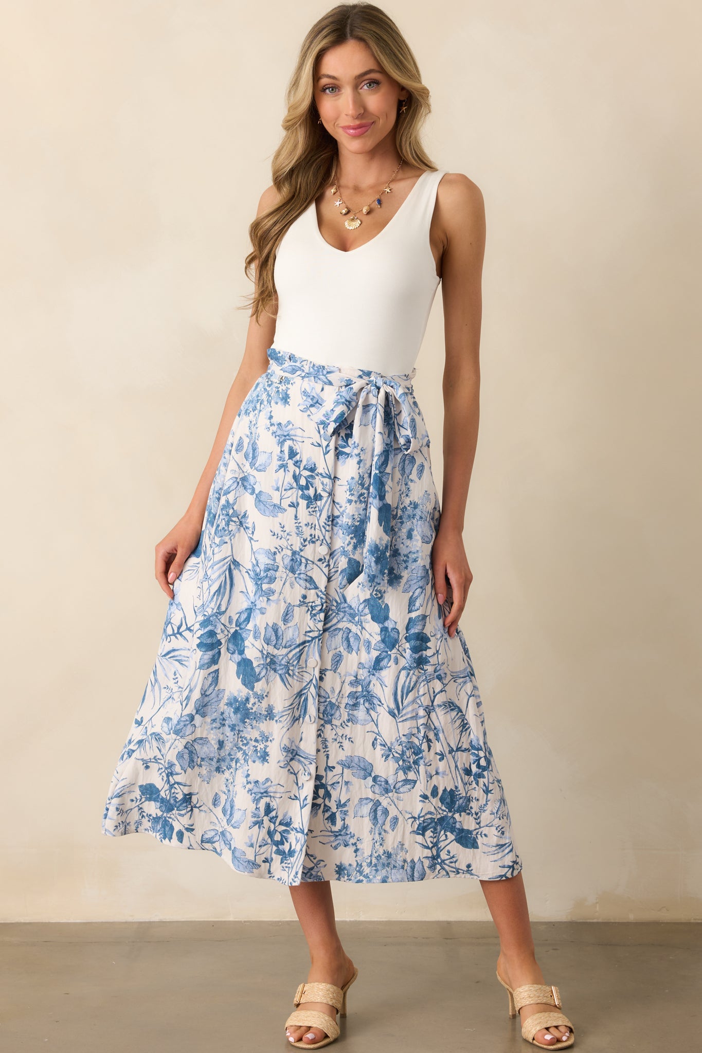Full body shot showcasing the skirt's optional self-tie belt and relaxed fit from waistband to hem.