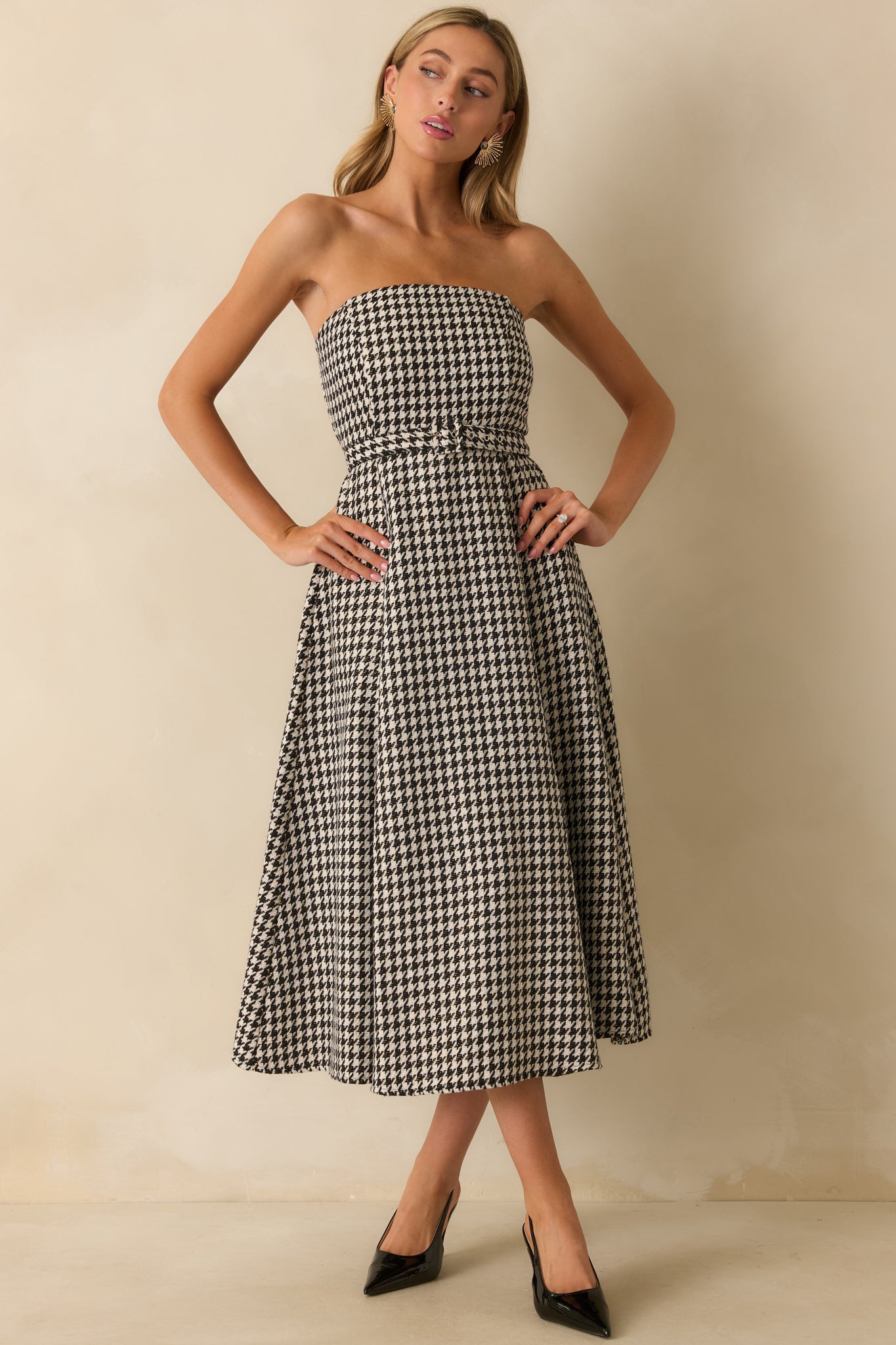 Full-length front view displaying the clean structure and refined finish of the bandeau dress.