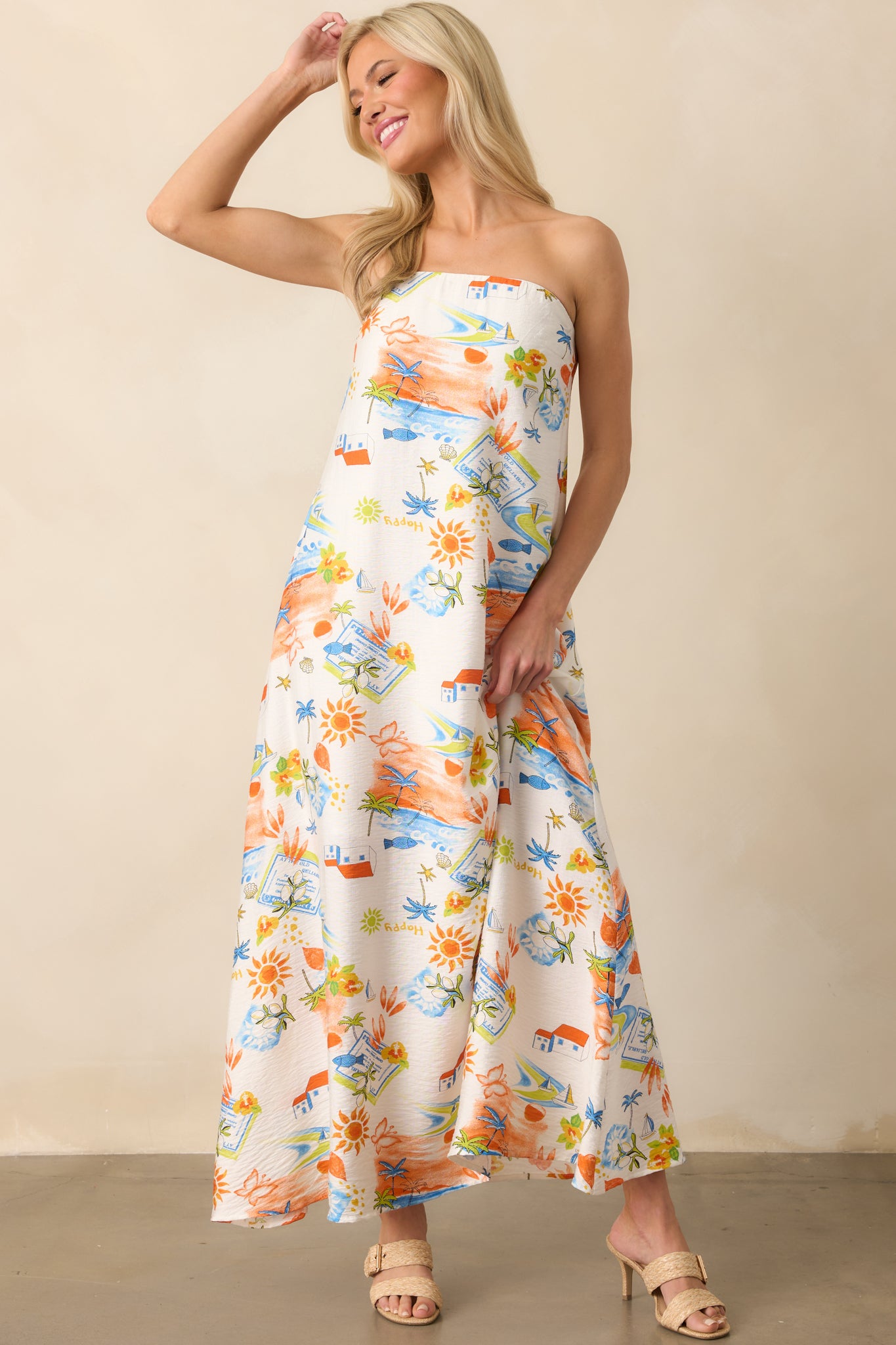 Straight-on full body image emphasizing the relaxed drape, subtle A-line shape, and bright mix of colors in the print.