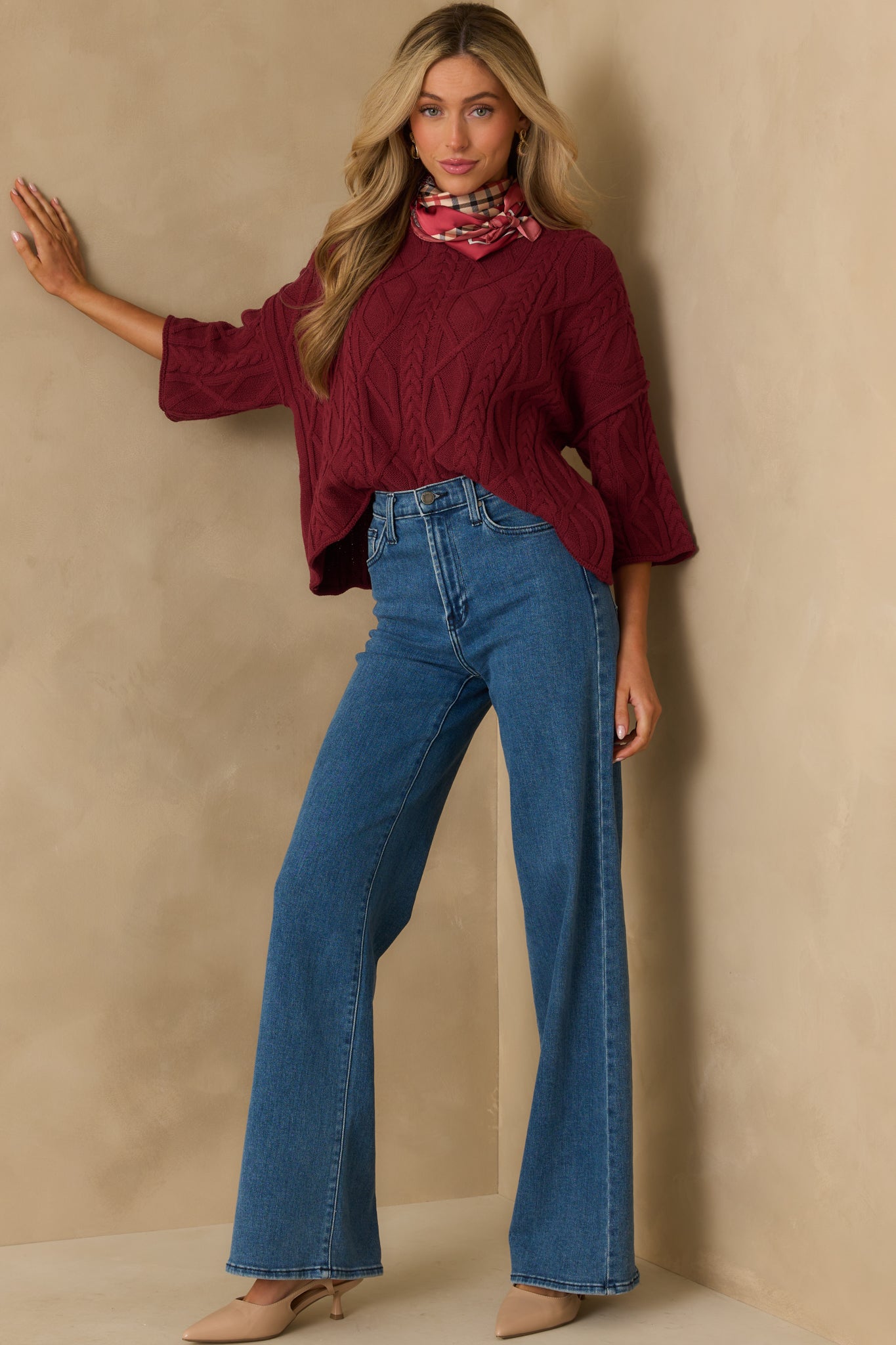 Full body image emphasizing the soft rolled hems at the sleeves and waistline.