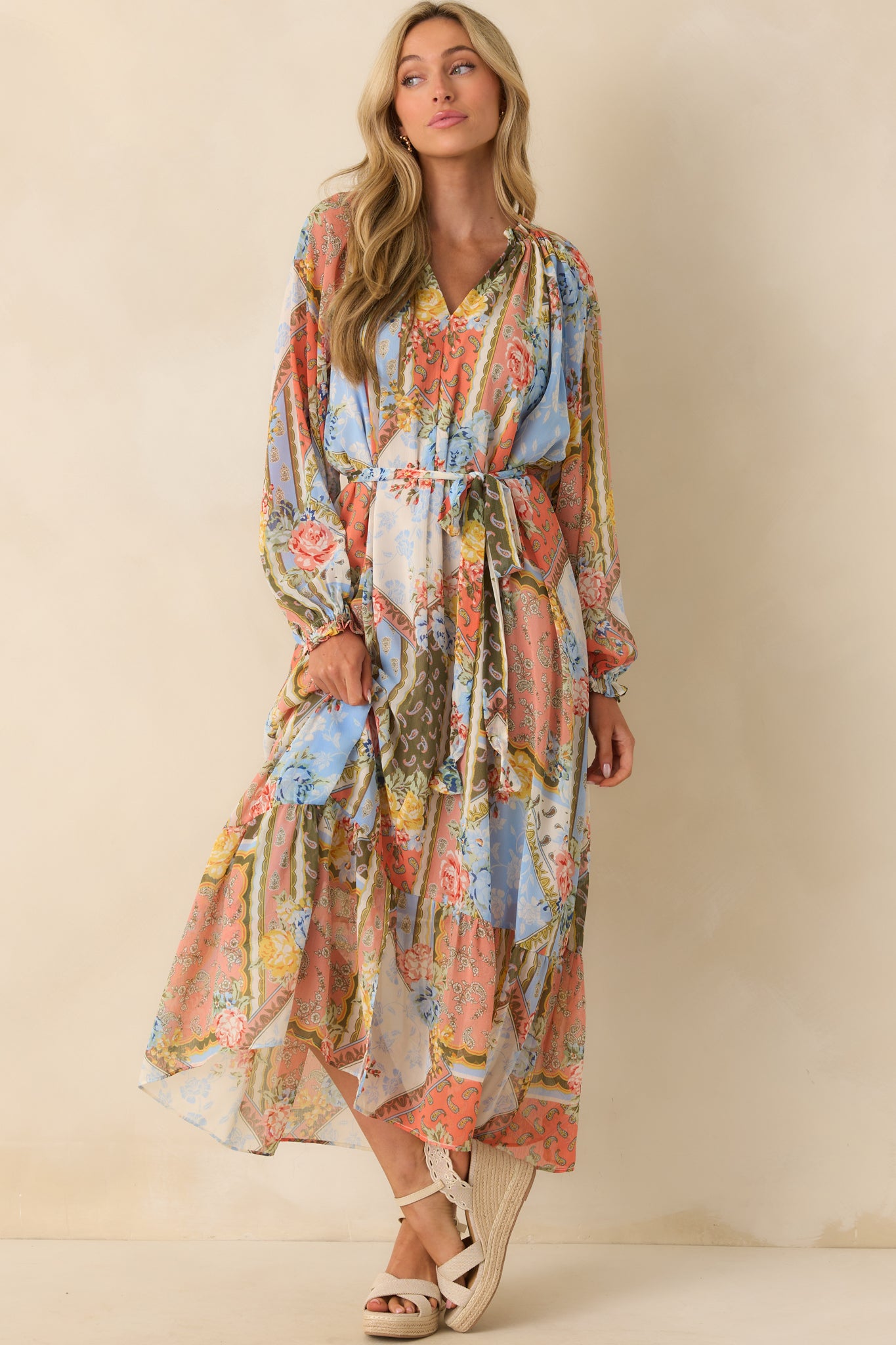 Front-facing full length image highlighting the self-tie belt cinching the waist and belt loops.