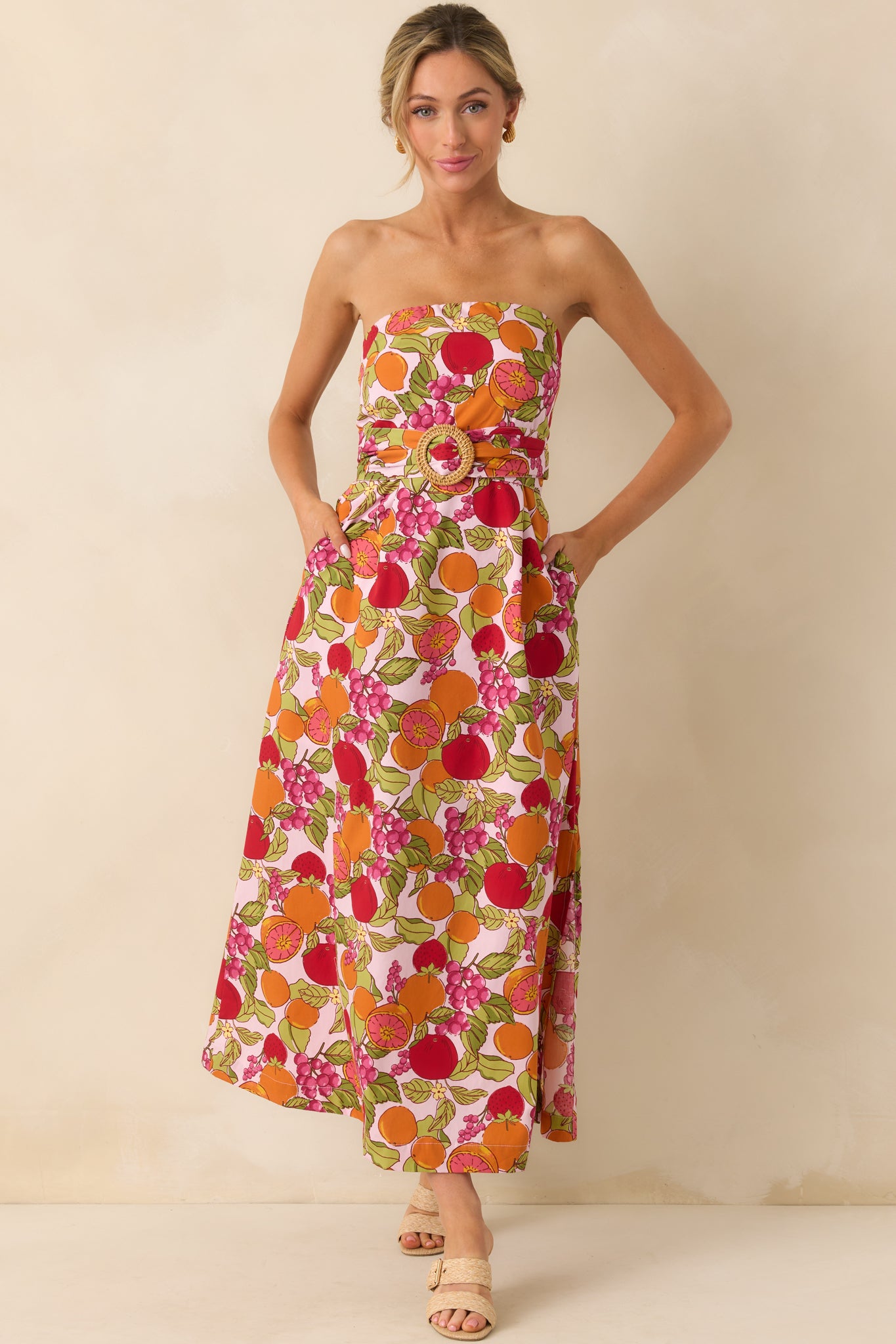 Full body image showcasing the optional woven pin buckle belt and the light pink mini lining peeking through the flowing skirt.