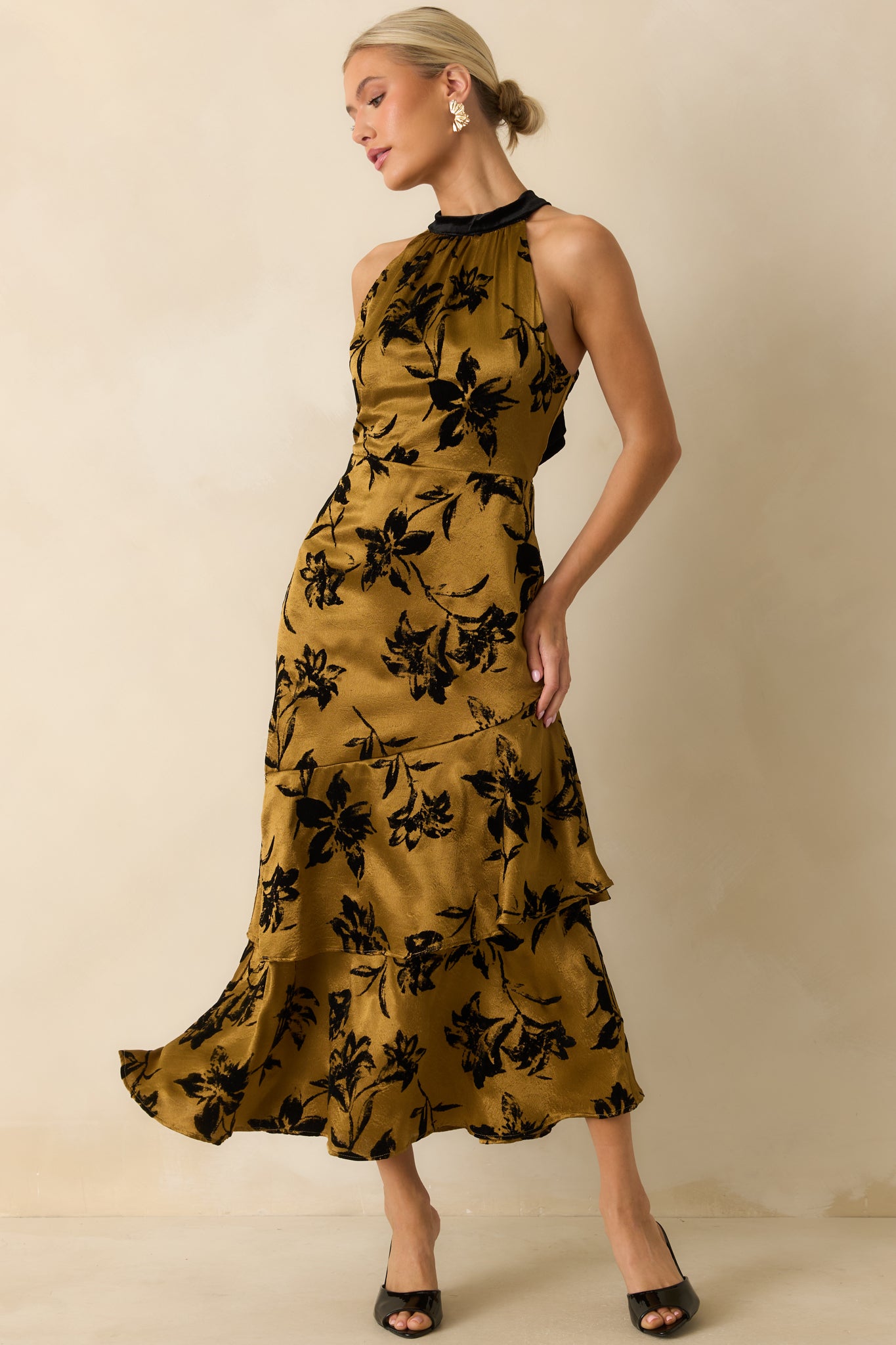 Full-length front view displaying the elegant silhouette of the floral satin midi dress with refined lining.