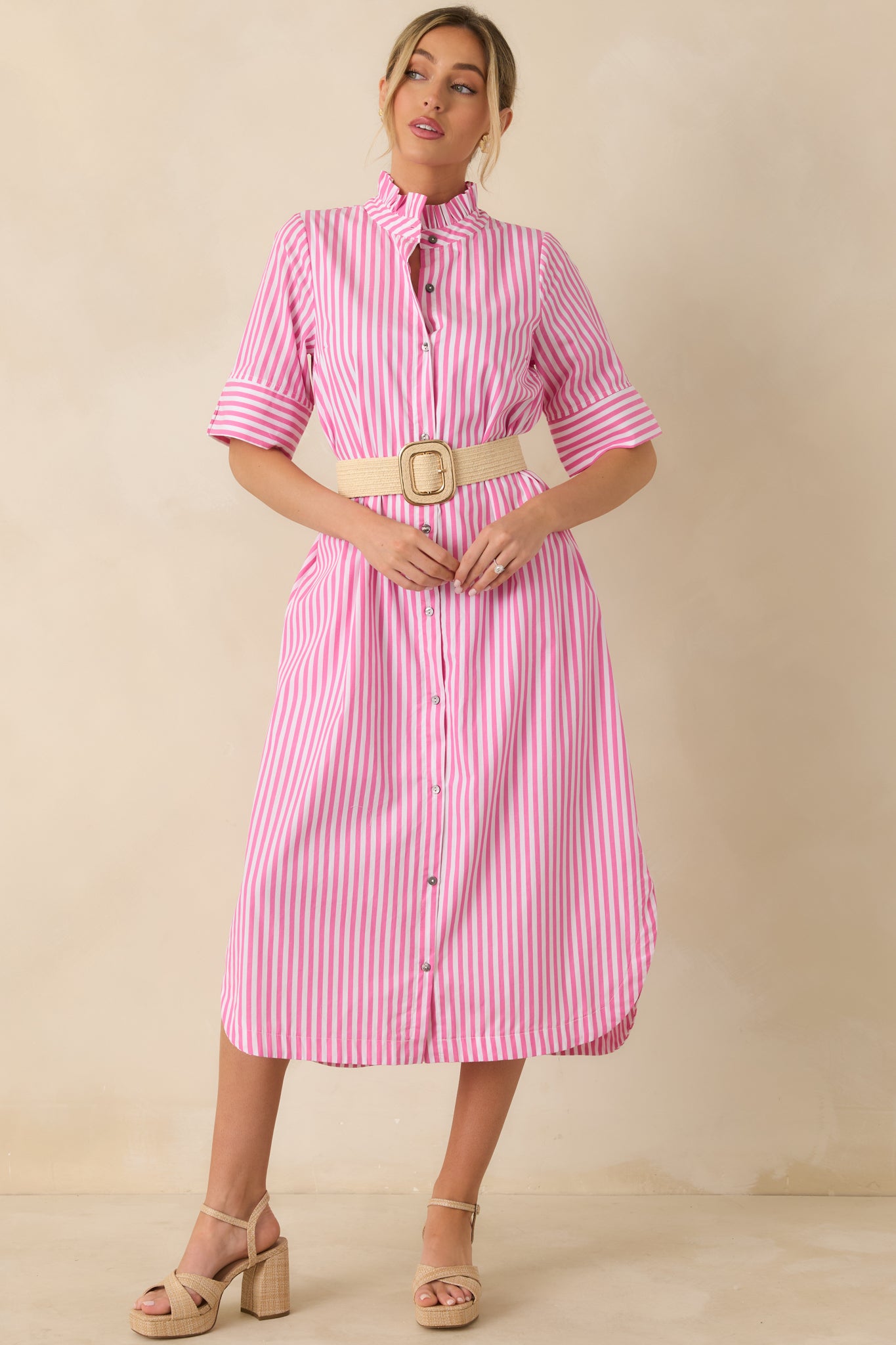 Full length front view capturing the effortless shape created by the relaxed shirt-dress silhouette.