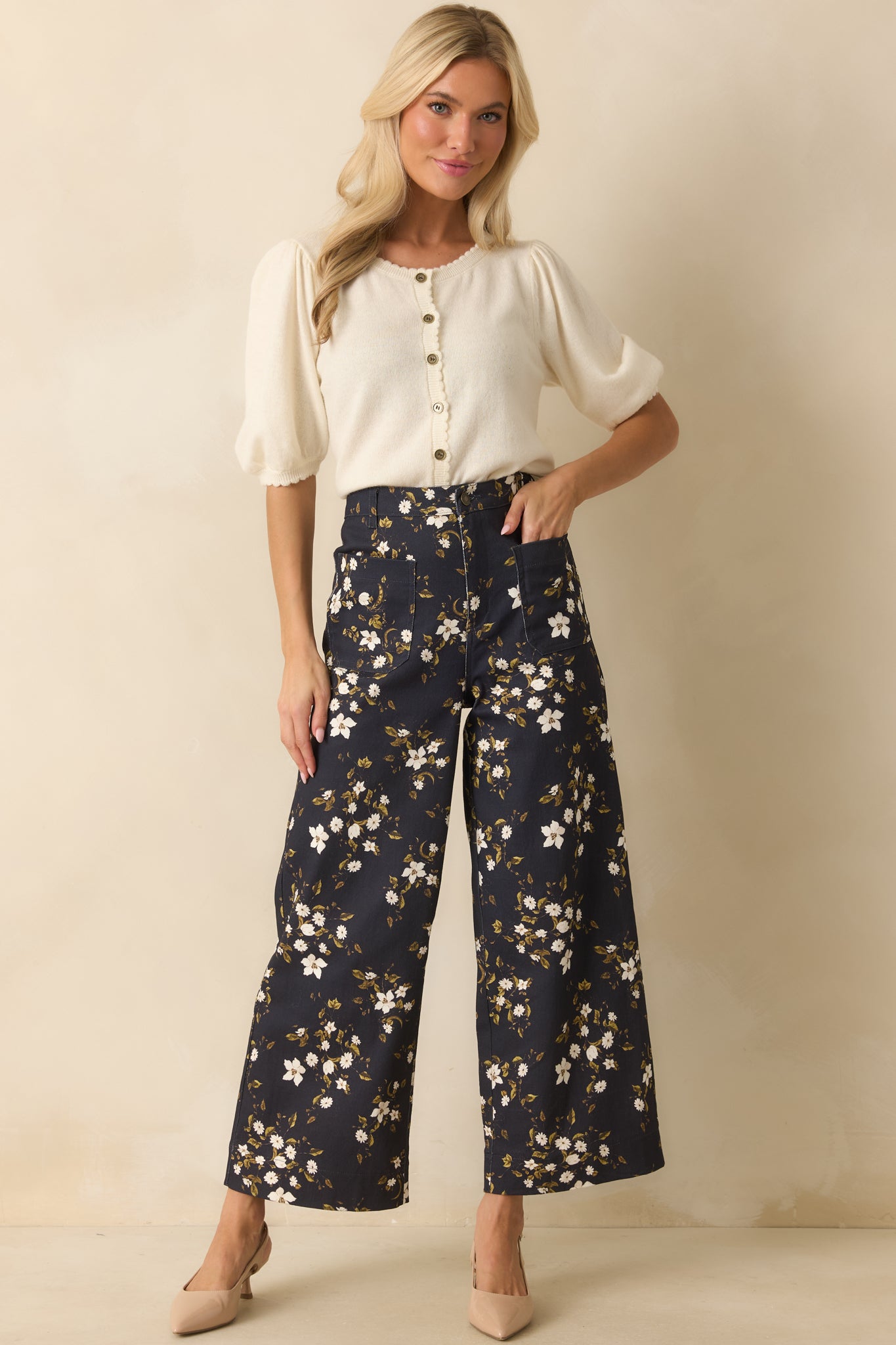 A full-length shot emphasizing the scallop trim details along the neckline and button placket.