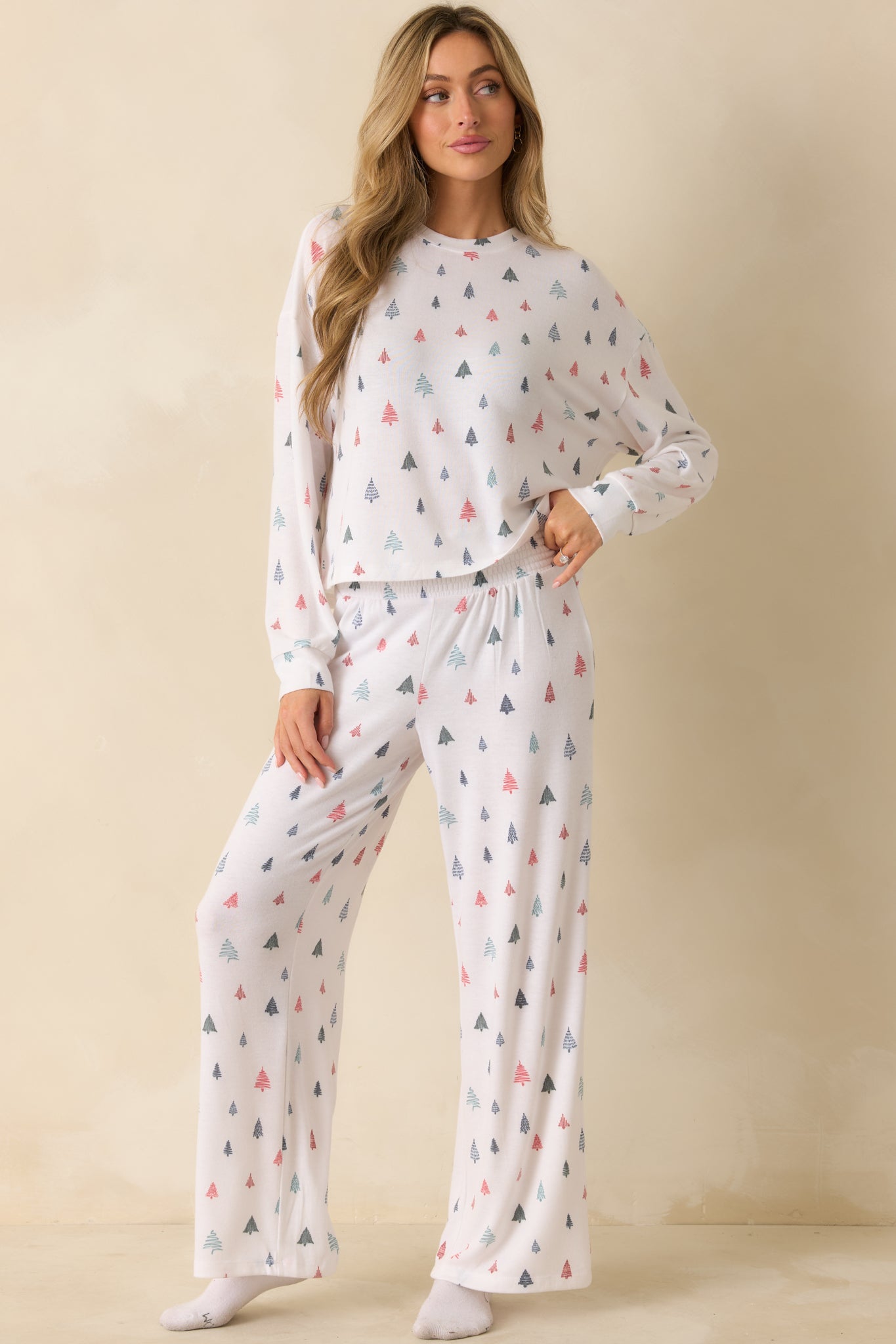 Full-length white multi pajama pants with wide-leg cut, smocked waistband, and cozy brushed knit texture.