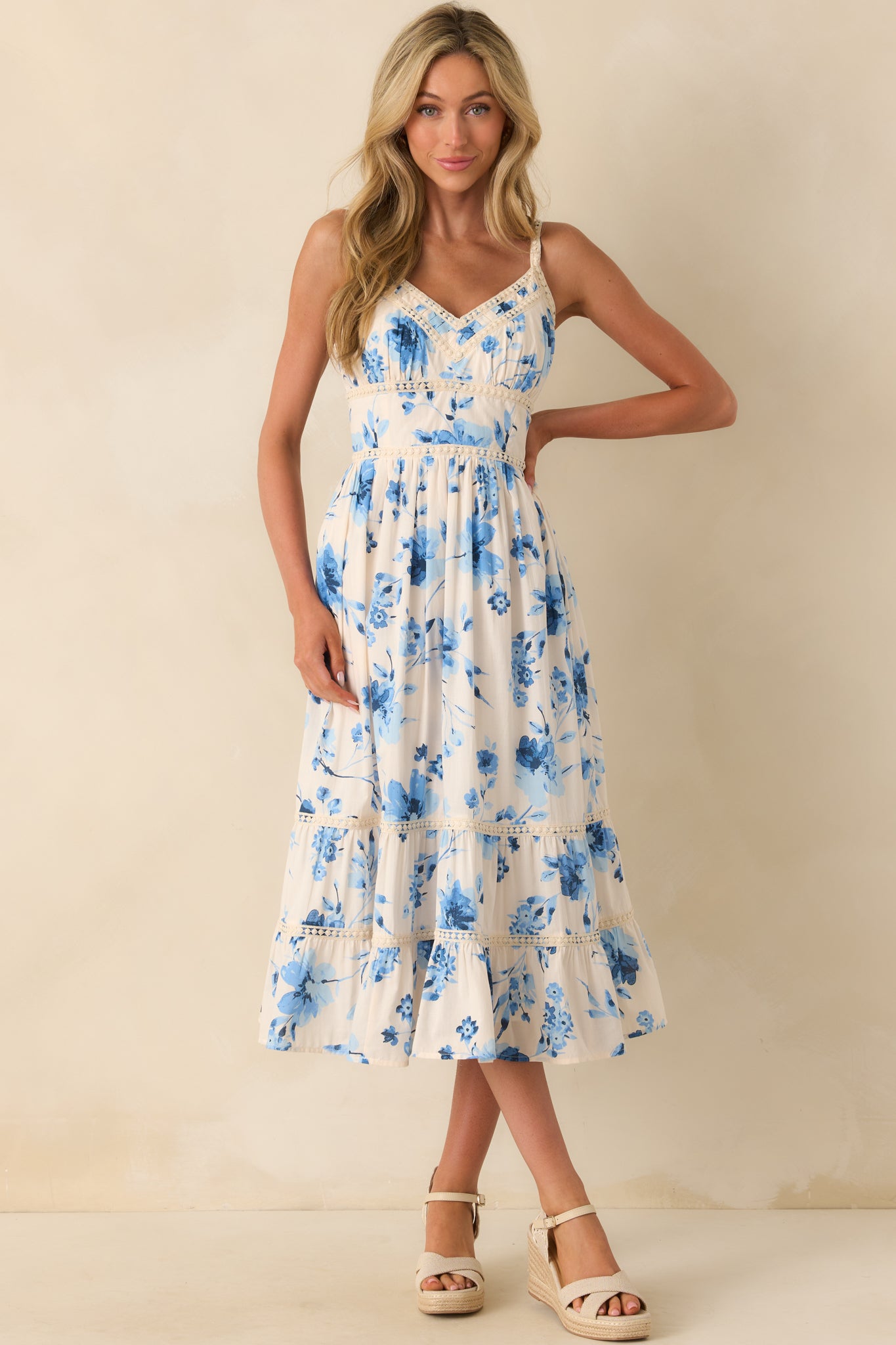 Full body shot focusing on the flowy silhouette and symmetrical placement of the floral print.