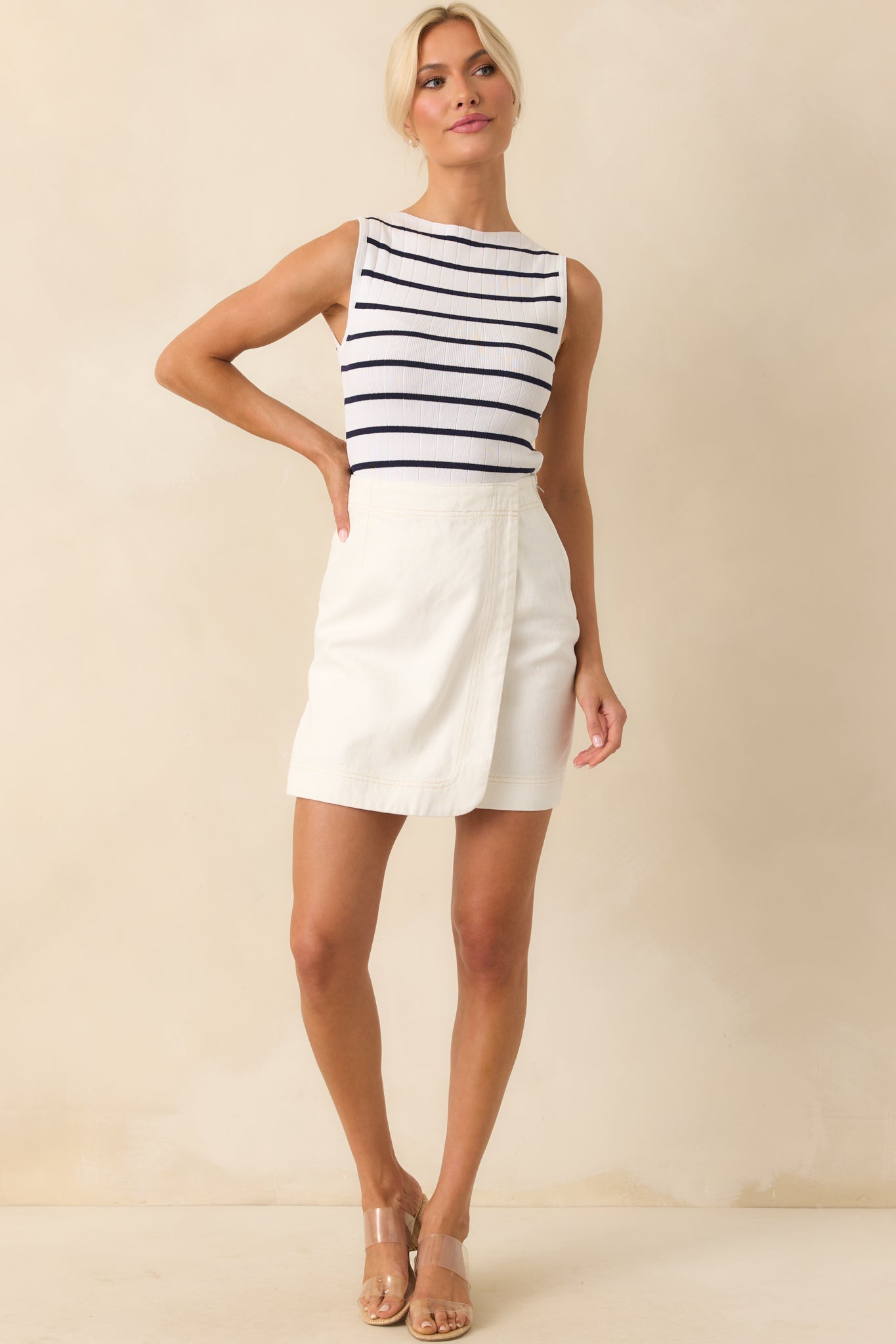 A full-length shot of the skirt highlighting the structured shape and visible beige contrast topstitching.