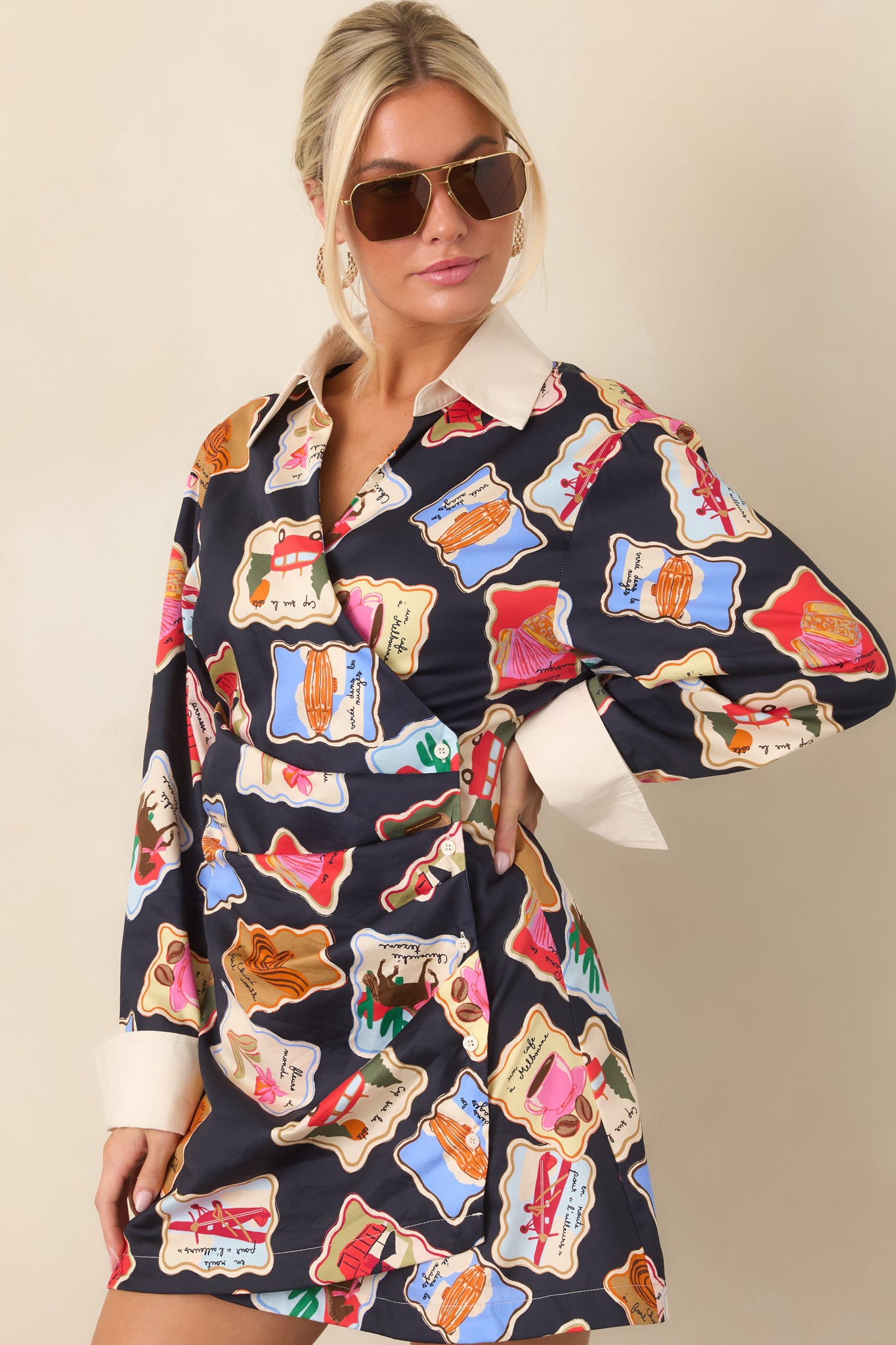 Detailed view of the dress's wrap-style front showing the gathered waist panel, subtle draping, and side button closure.