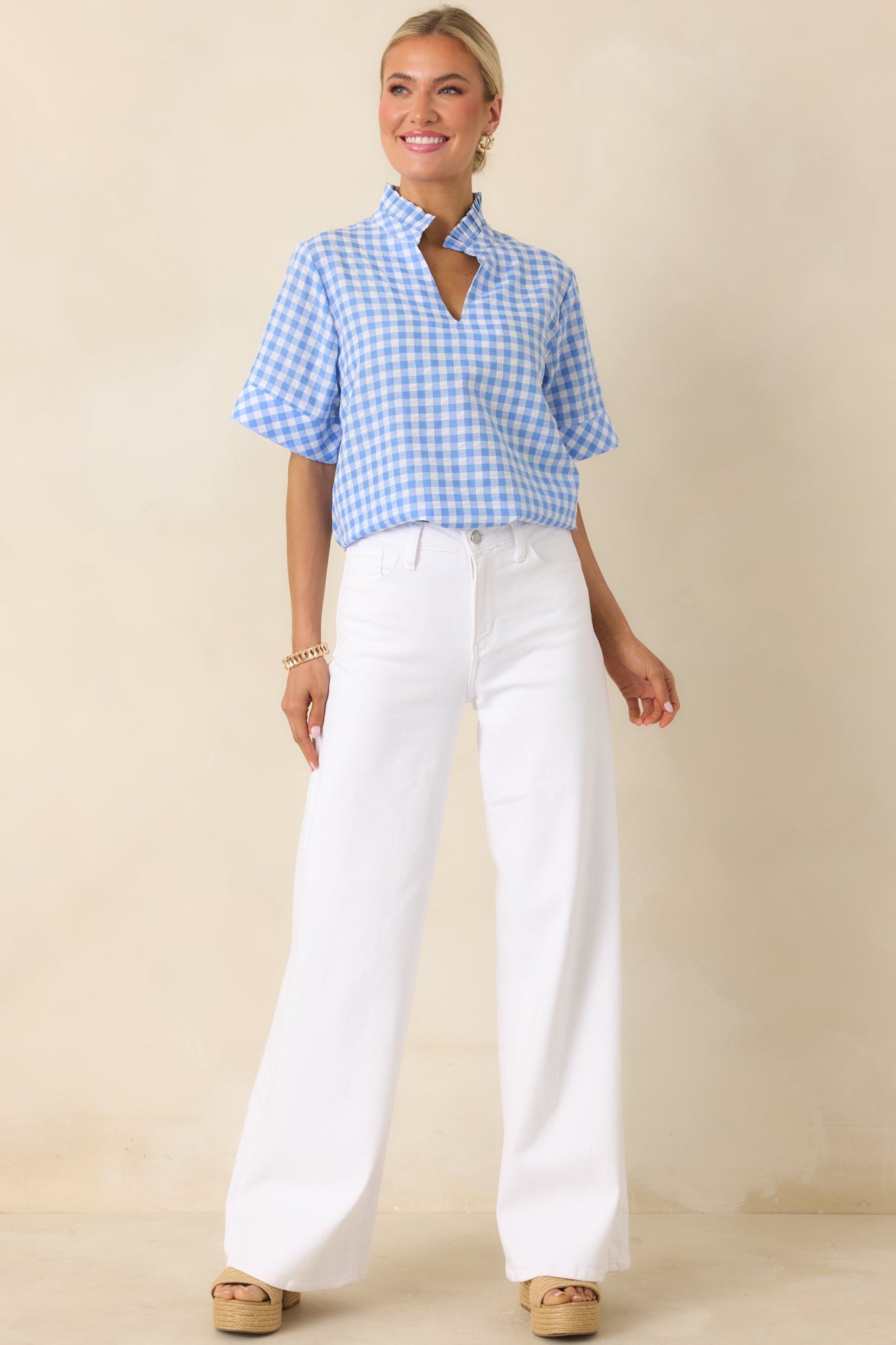 Gingham blouse with casual polished look and easy drape.
