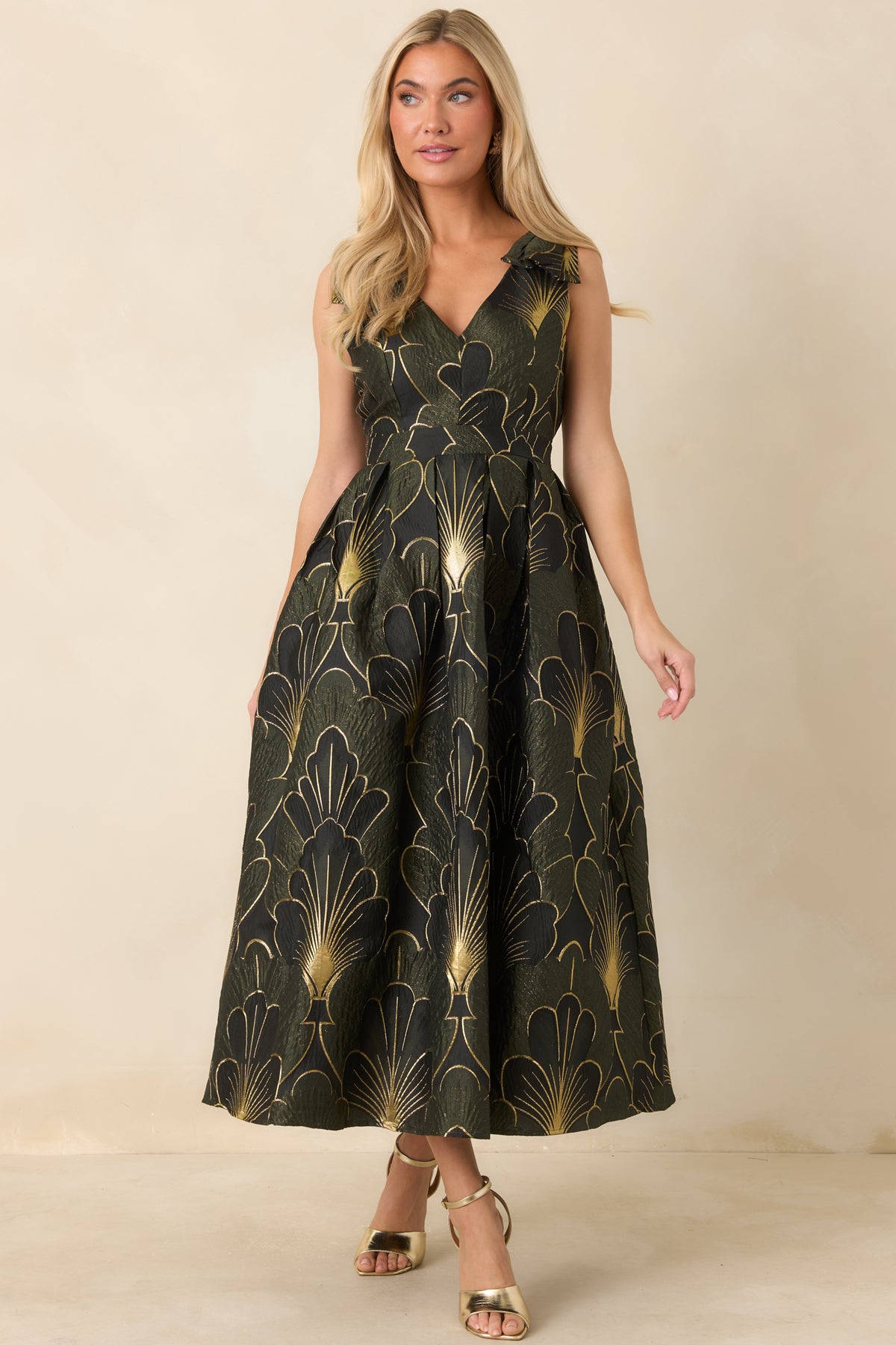 Gold-accented floral jacquard dress with a defined waist and voluminous midi-length skirt.