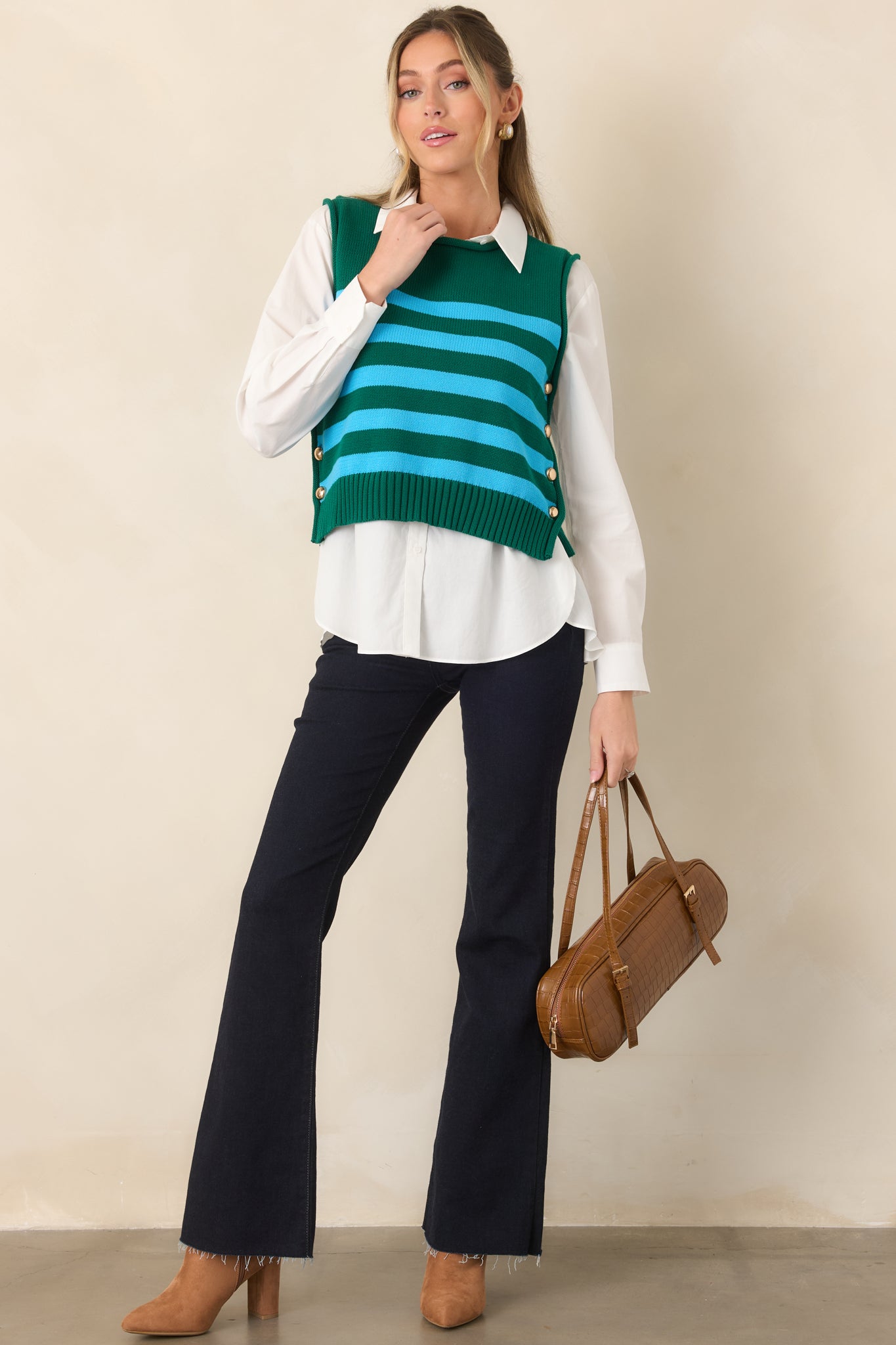 Green cotton top with bold aqua horizontal stripes, a round ribbed neckline, relaxed boxy silhouette, ribbed hem, and gold-tone buttons along the sides.