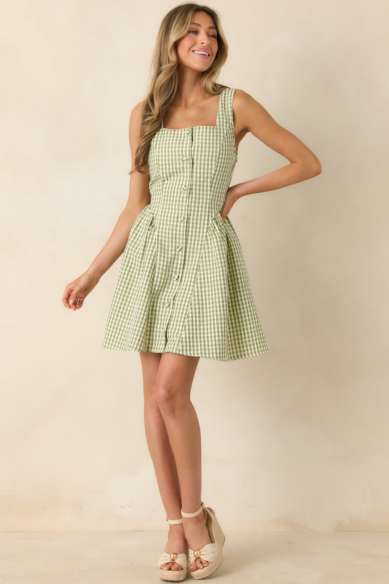 Fresh green gingham mini dress featuring a relaxed fit and structured square neckline.