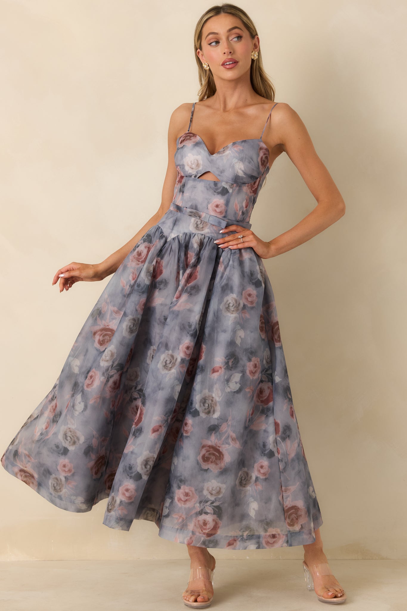Strapless grey floral midi dress with a tailored bodice and smooth, flowing skirt for layered movement.