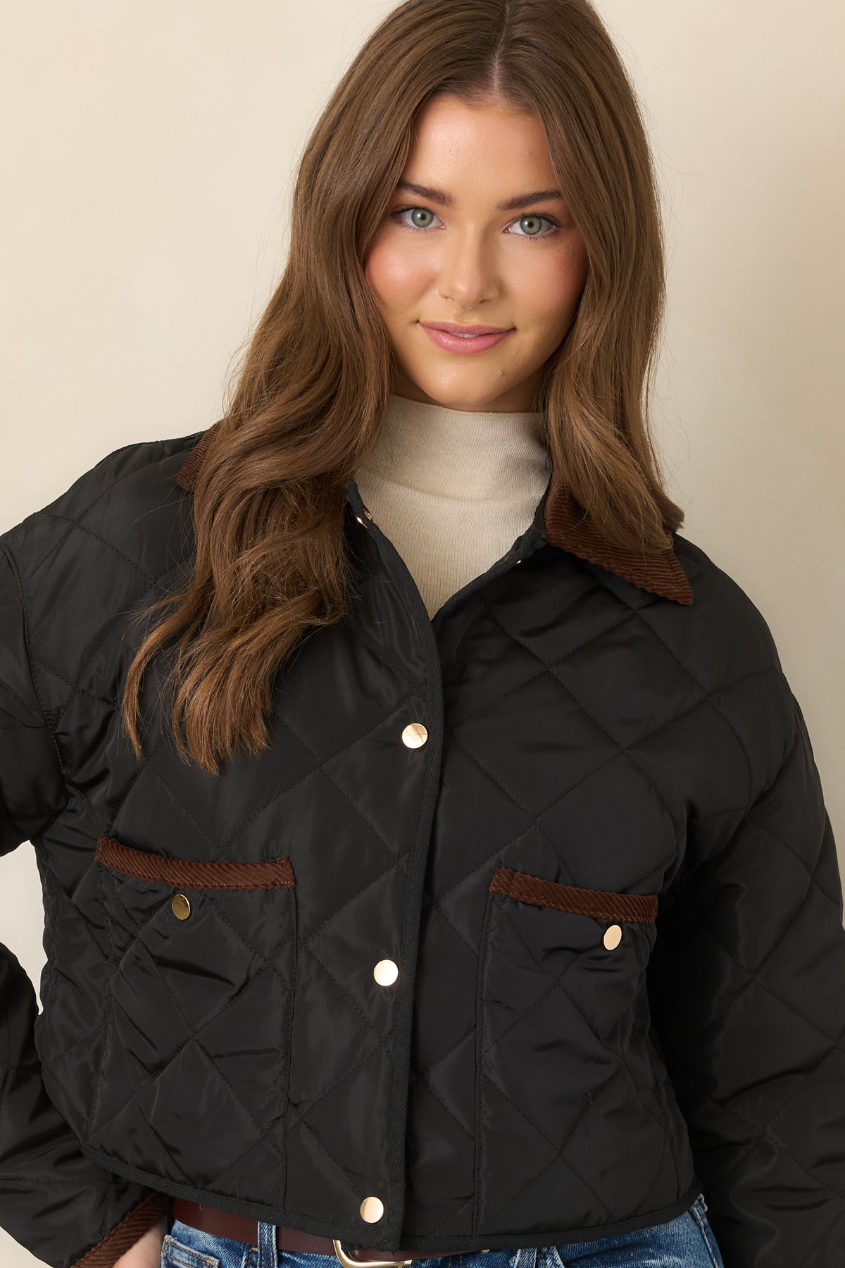 Heritage-inspired jacket showcasing the textured diamond stitching and neatly contrast-trimmed front patch pockets.