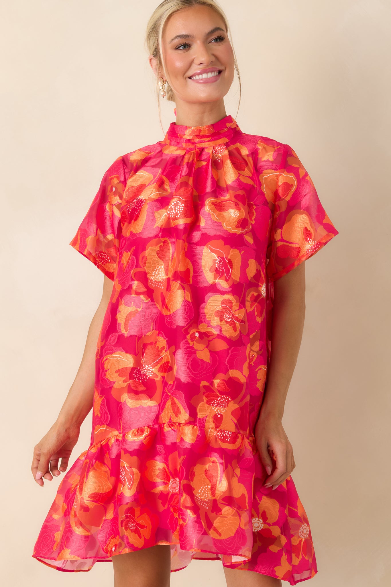 High neckline detail with soft gathered bodice and airy fabric texture.