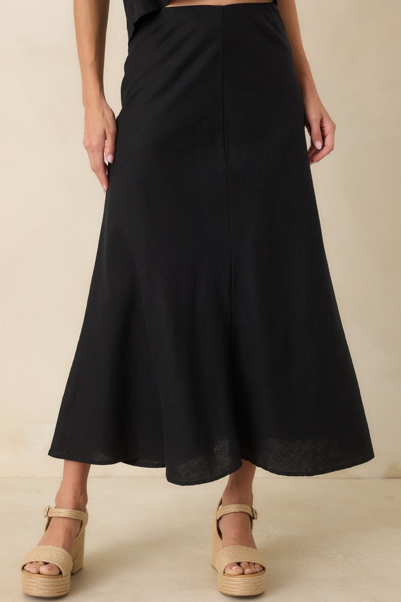 Close view of the high-rise elastic waistband showcasing the comfortable pull-on design and clean finish.