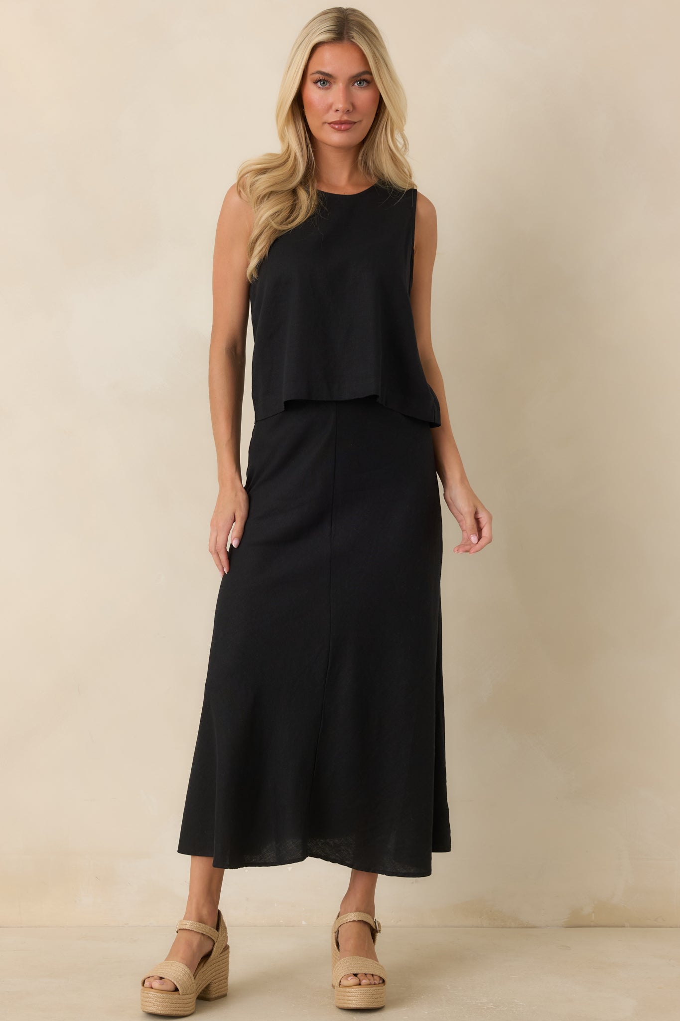 High-rise linen-blend skirt featuring a soft draped texture, relaxed movement, and effortless everyday style.
