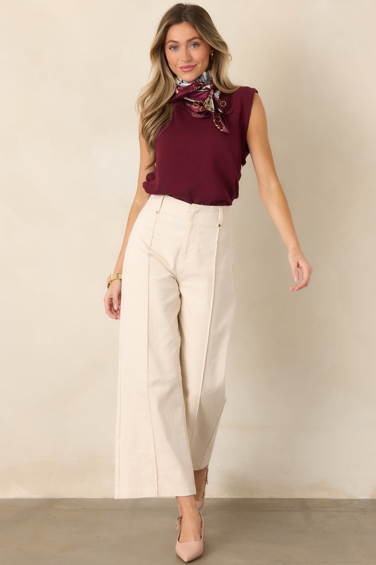 Versatile stretch pants showcasing their polished high-rise fit and cleanly tailored front.