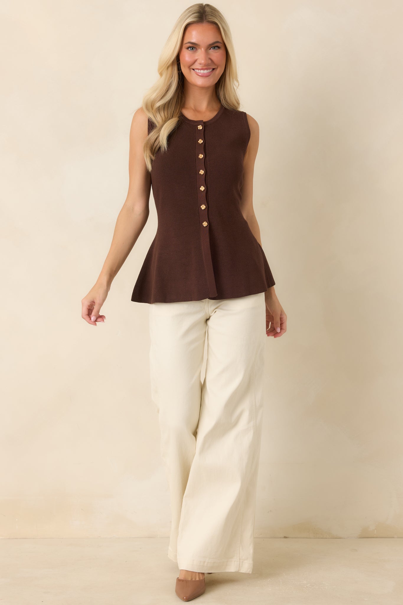 High-rise cotton blend jeans featuring a relaxed wide leg silhouette, clean design, and full-length fit.