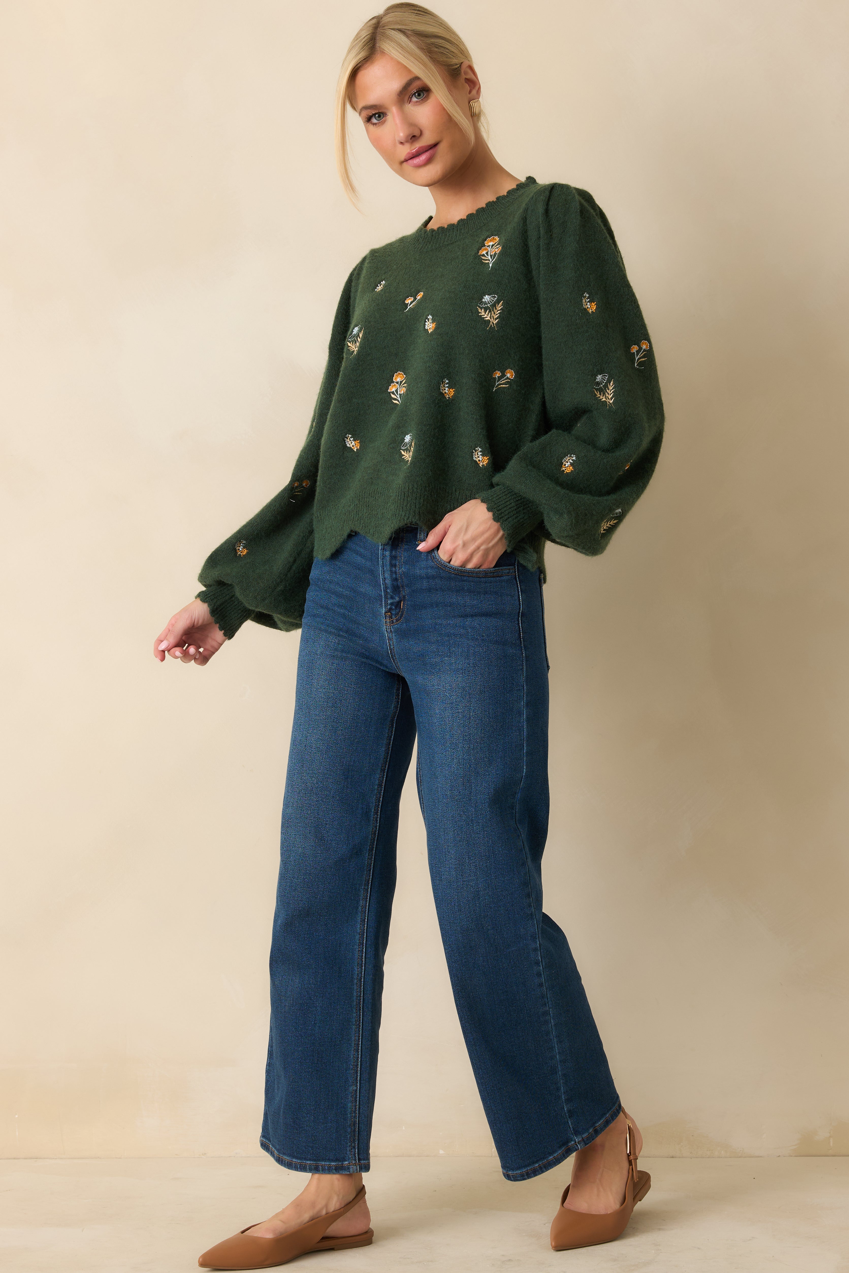 Relaxed hunter green floral sweater with soft balloon sleeves and textured knit.