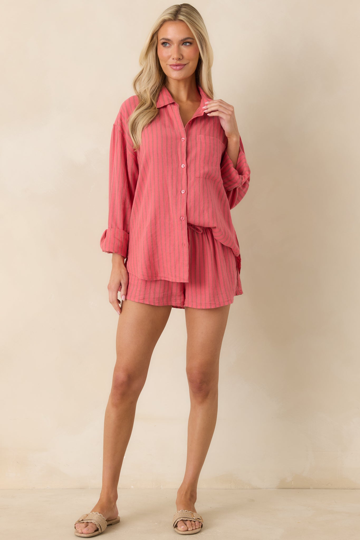 Indigo striped top with breathable fabric, chest pocket detail, and easy draped silhouette.