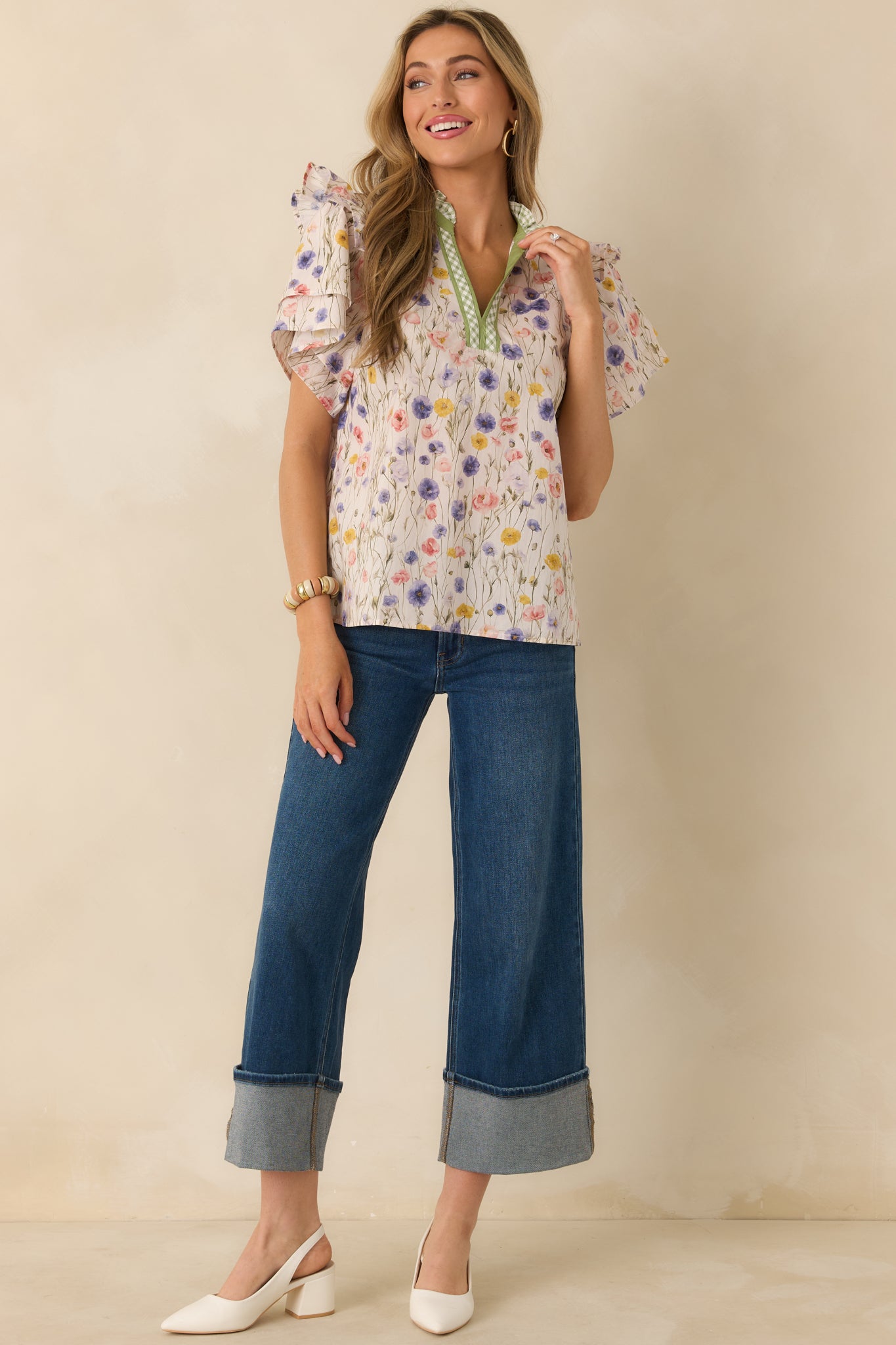 Ivory cotton blouse covered in a lively multicolor floral print, designed in a relaxed, easy shape.