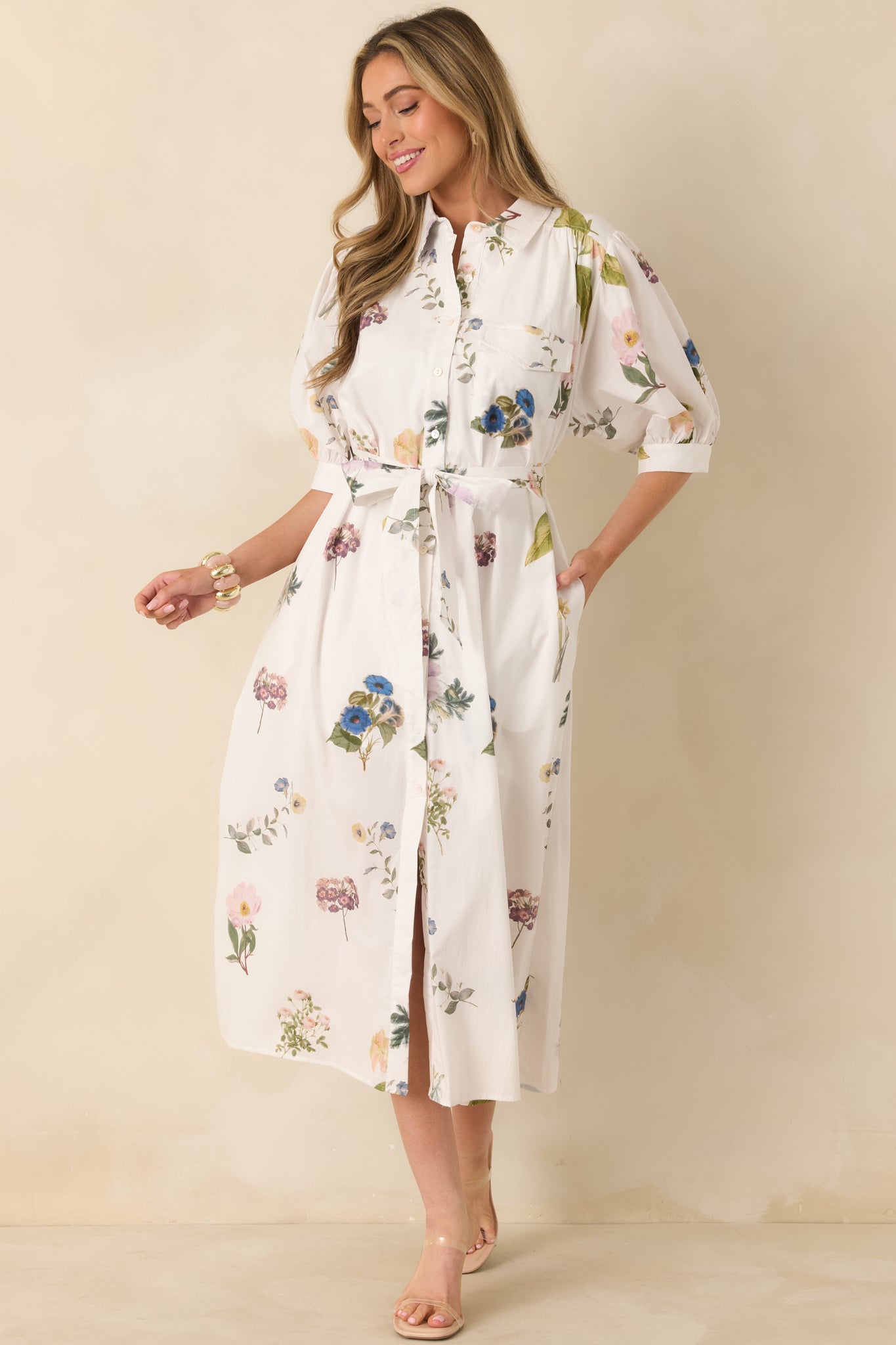 Ivory cotton dress with short sleeves designed for soft, subtle everyday volume.