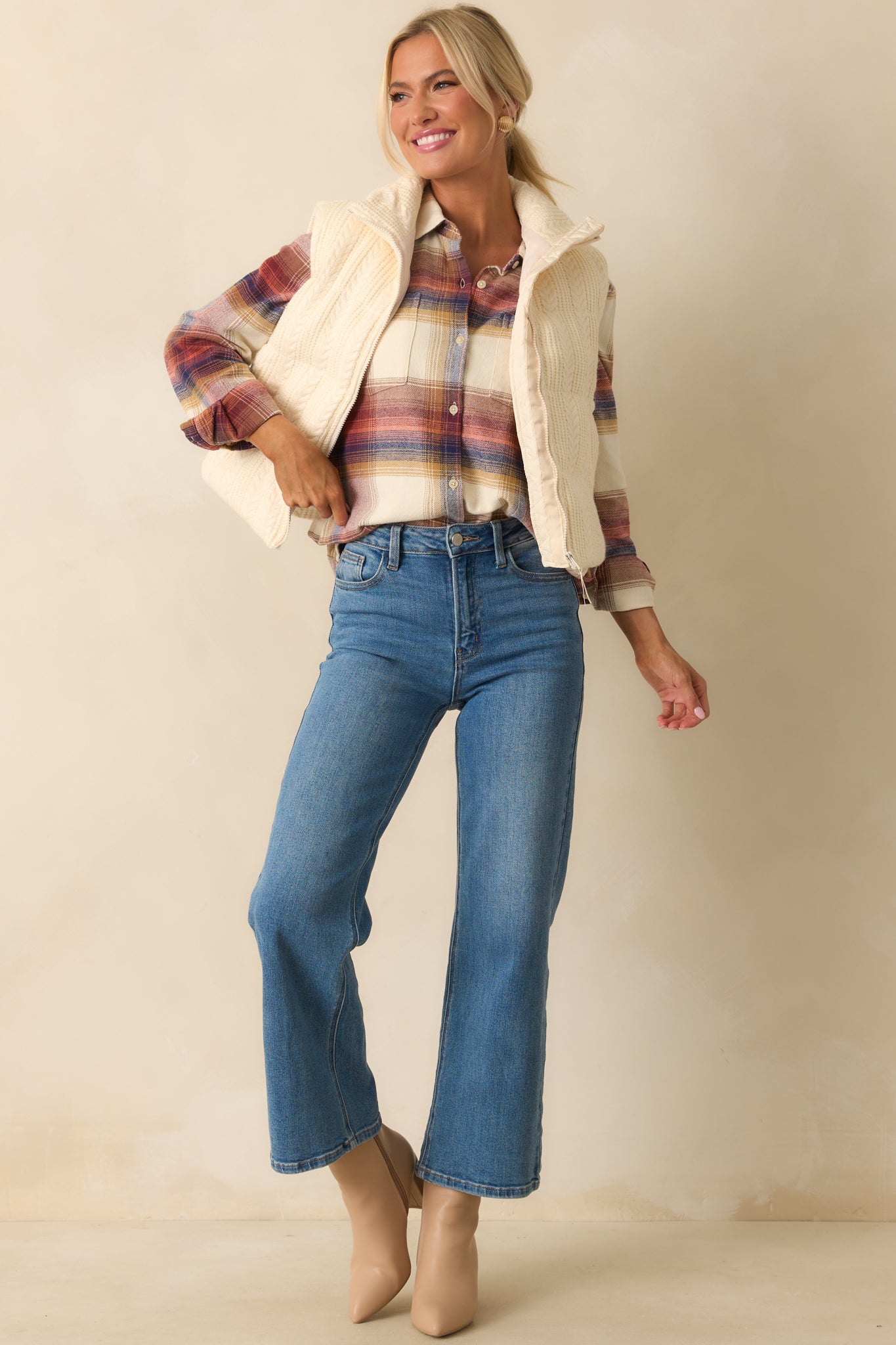 Ivory flannel shirt showcasing multi plaid pattern, buttoned cuffs, and front closure, relaxed silhouette front view.