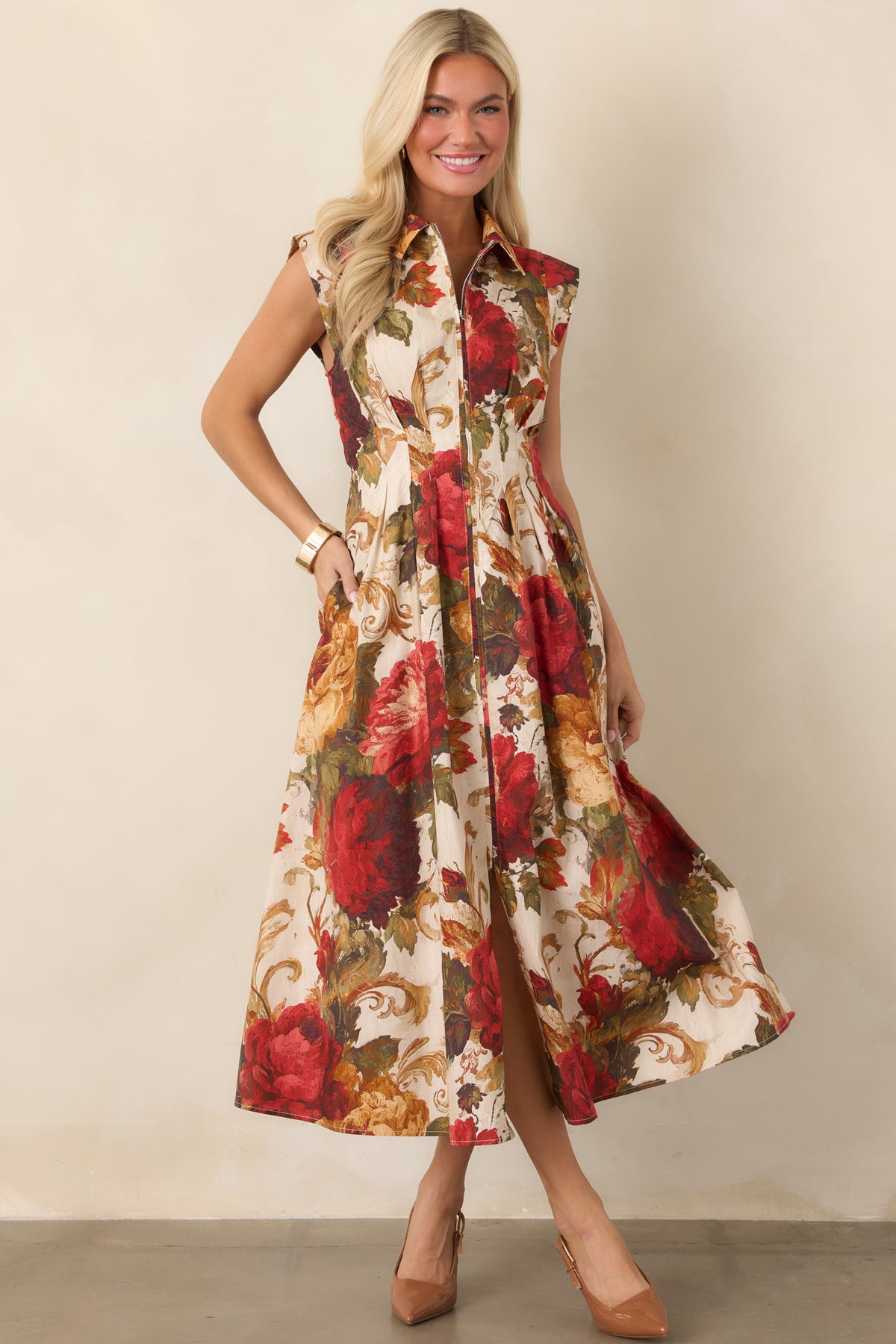 Ivory floral dress showcasing the fitted bodice and full zip front.