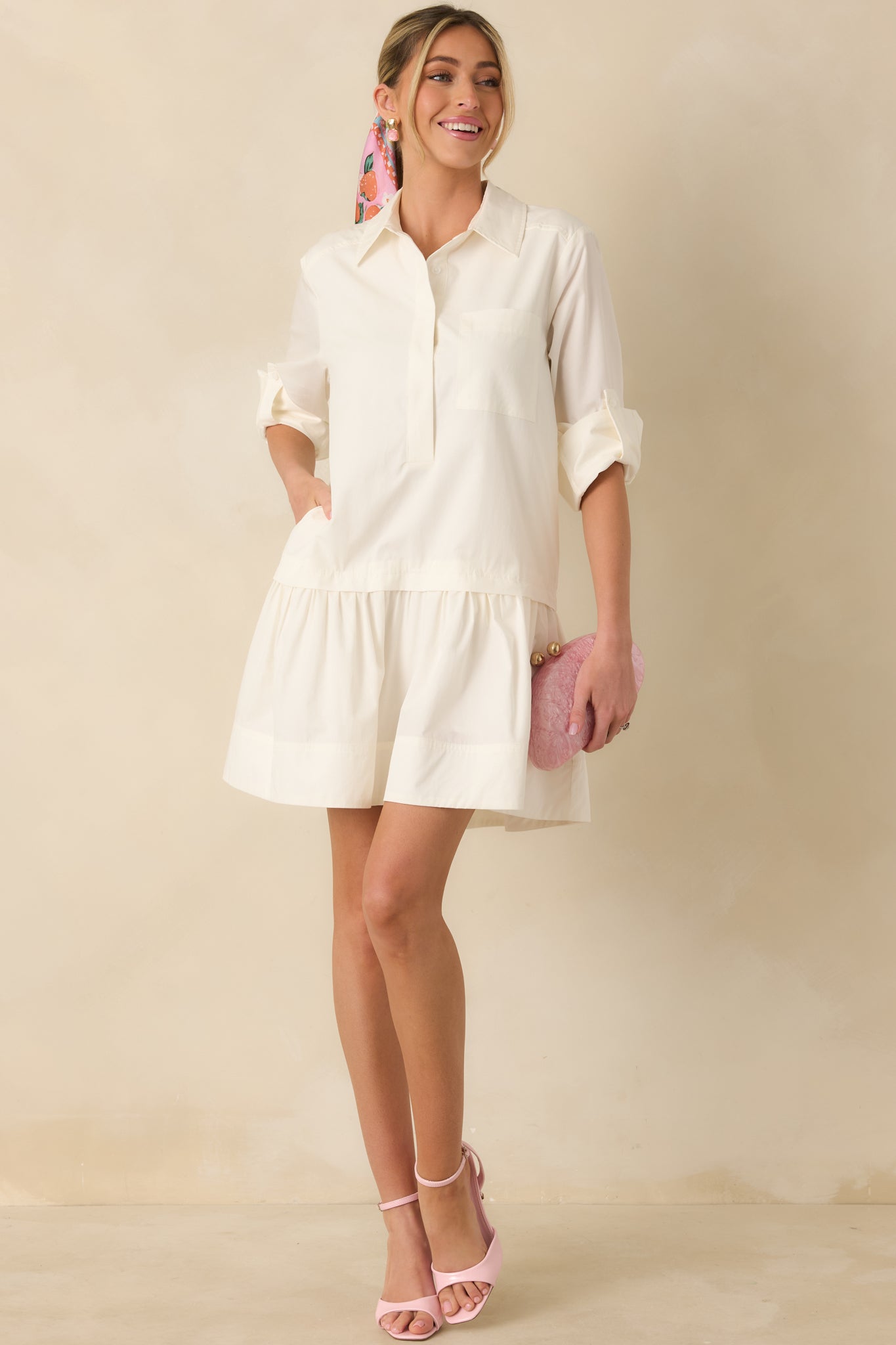 Straight-on front angle showing the lightweight cotton-blend fabric, smooth silhouette, and functional side pockets.